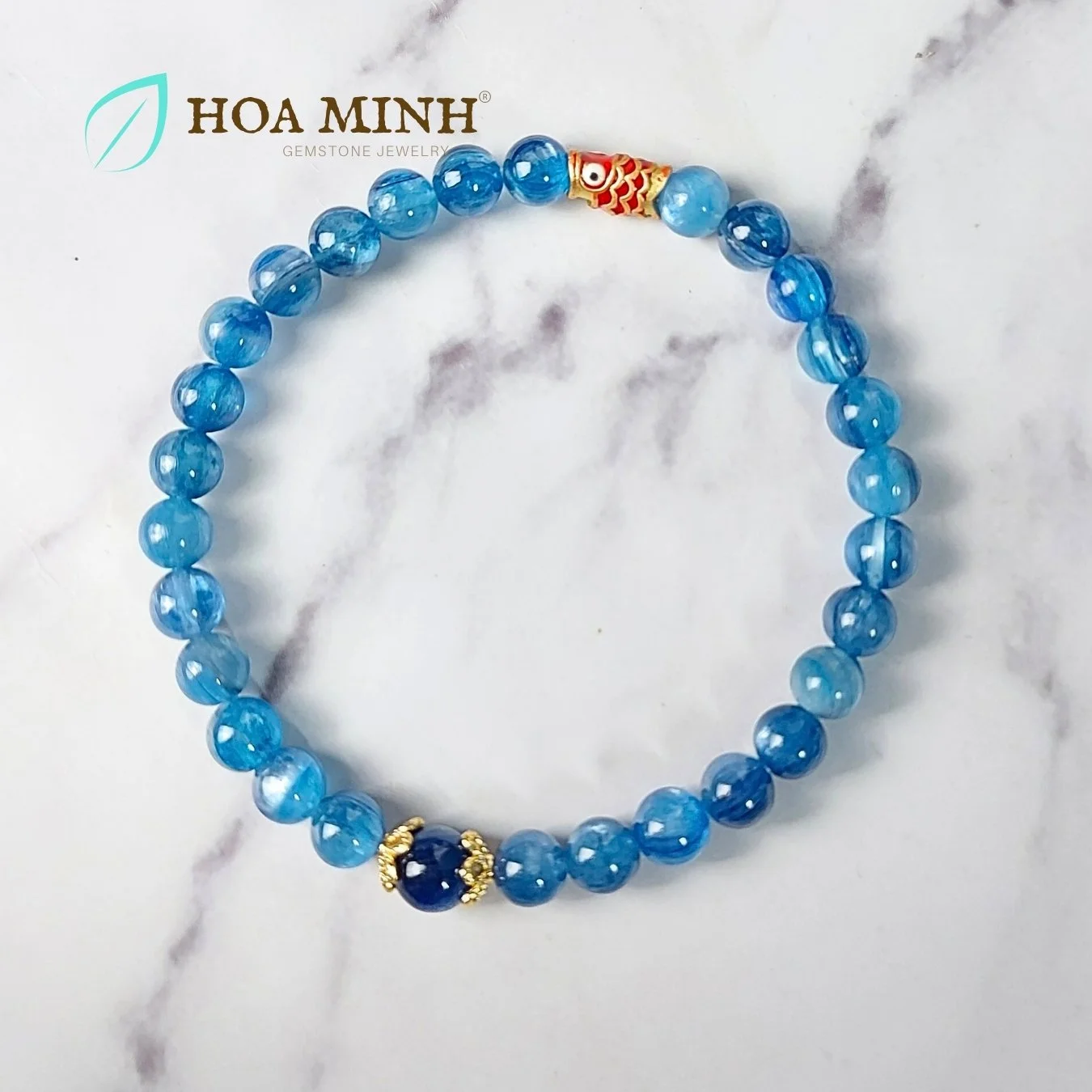 9-vong-tay-da-kyanite-vip-sapphia-nuoc-tu-nhien-size-mini-5-8-li-phoi-charm-op-hoa-charm-ca-chep-xo-ngang-xinh-xan-hoa-minh-gem.jpg