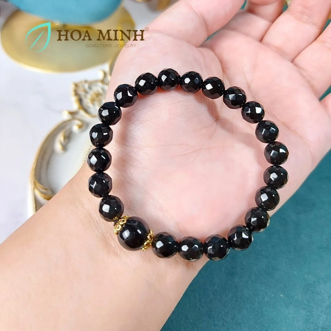 2-vong-tay-da-ma-nao-den-tron-cat-giac-lap-lanh-size-hat-8-li-phoi-vien-da-ma-nao-den-tron-op-charm-xi-vang-hoa-mai-hoa-minh-gem.jpg