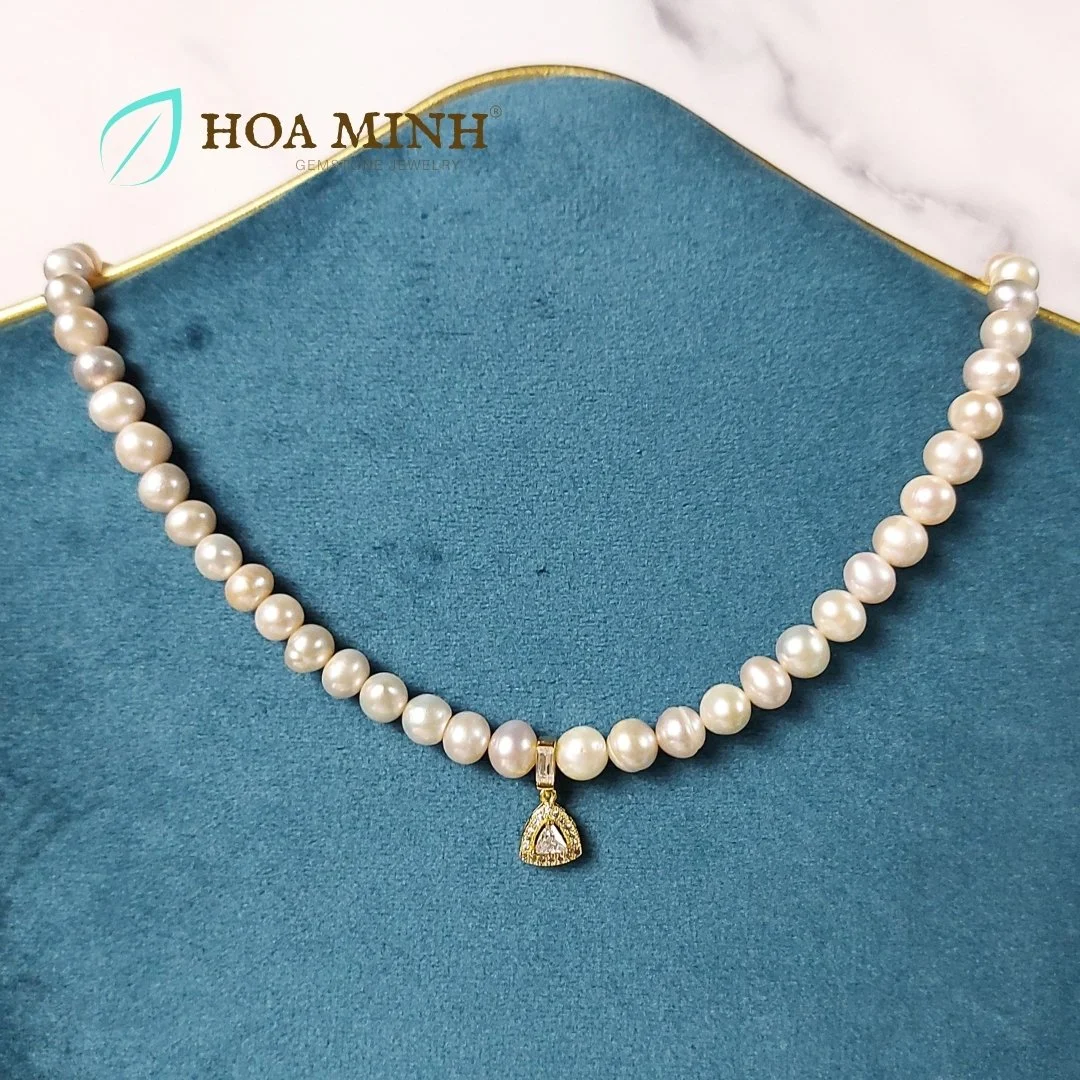 8-chuoi-co-ngoc-trai-nuoi-tu-nhien-mau-anh-hong-size-hat-7-2-li-phoi-mat-dinh-da-tam-tam-giac-dai-day-40-45cm-tuyet-dep-hoa-minh-gem.jpg