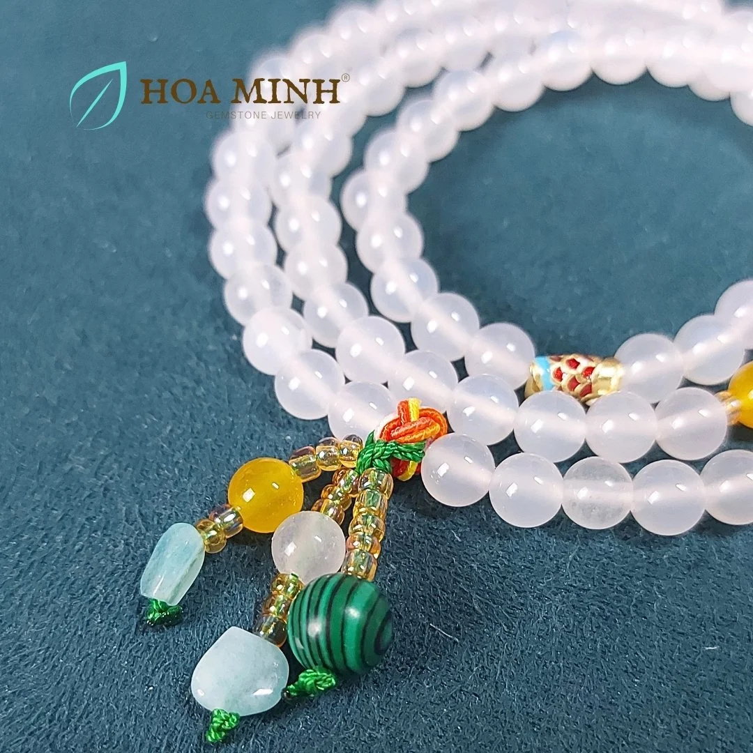 3-vong-tay-quan-3-da-ma-nao-trang-size-hat-6-3-li-mix-charm-ca-xo-ngang-vien-da-amazonite-cung-mot-so-loai-da-ma-nao-mau-thoi-trang-hoa-minh-gem.jpg
