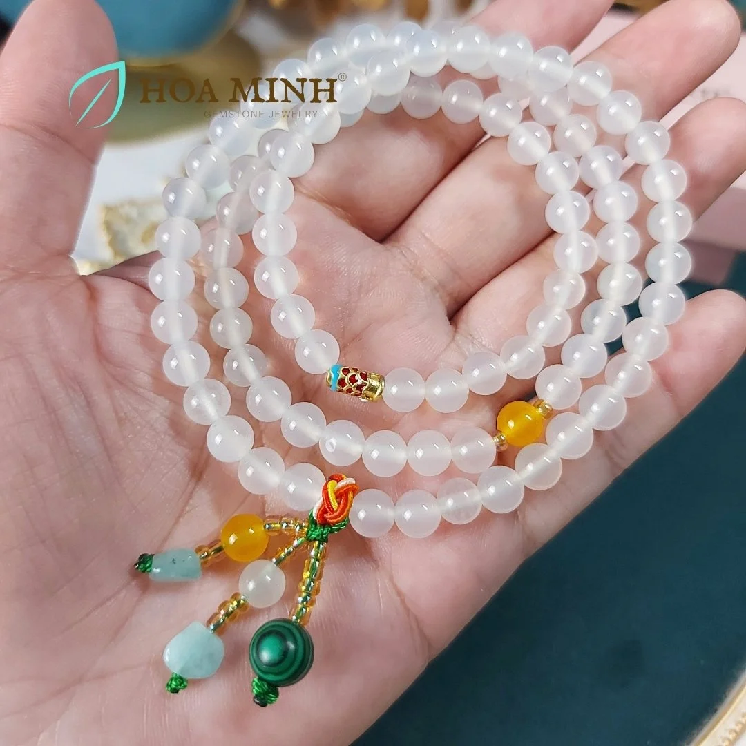 9-vong-tay-quan-3-da-ma-nao-trang-size-hat-6-3-li-mix-charm-ca-xo-ngang-vien-da-amazonite-cung-mot-so-loai-da-ma-nao-mau-thoi-trang-hoa-minh-gem.jpg