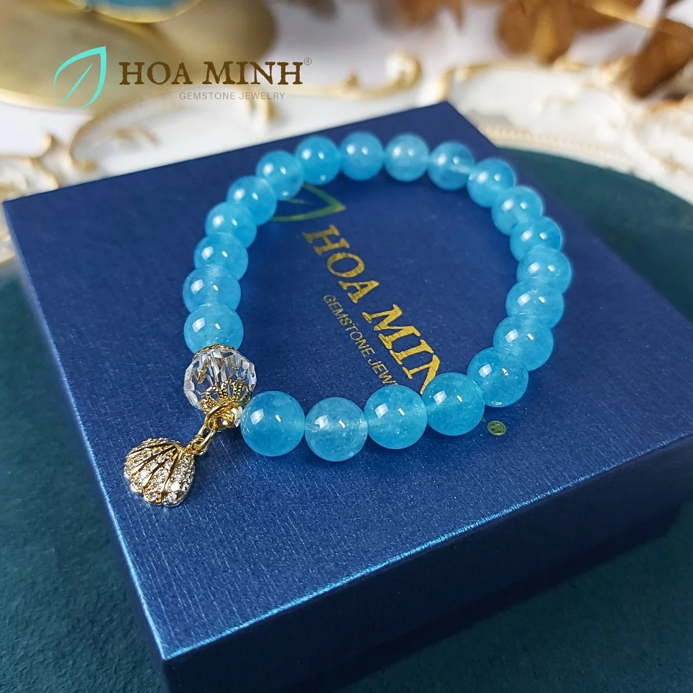 3-vong-tay-ngoc-hai-lam-aquamarine-8-li-phoi-vien-thach-anh-trang-oval-cat-giac-op-hoa-charm-treo-so-dinh-da-hoa-minh-gem.jpg