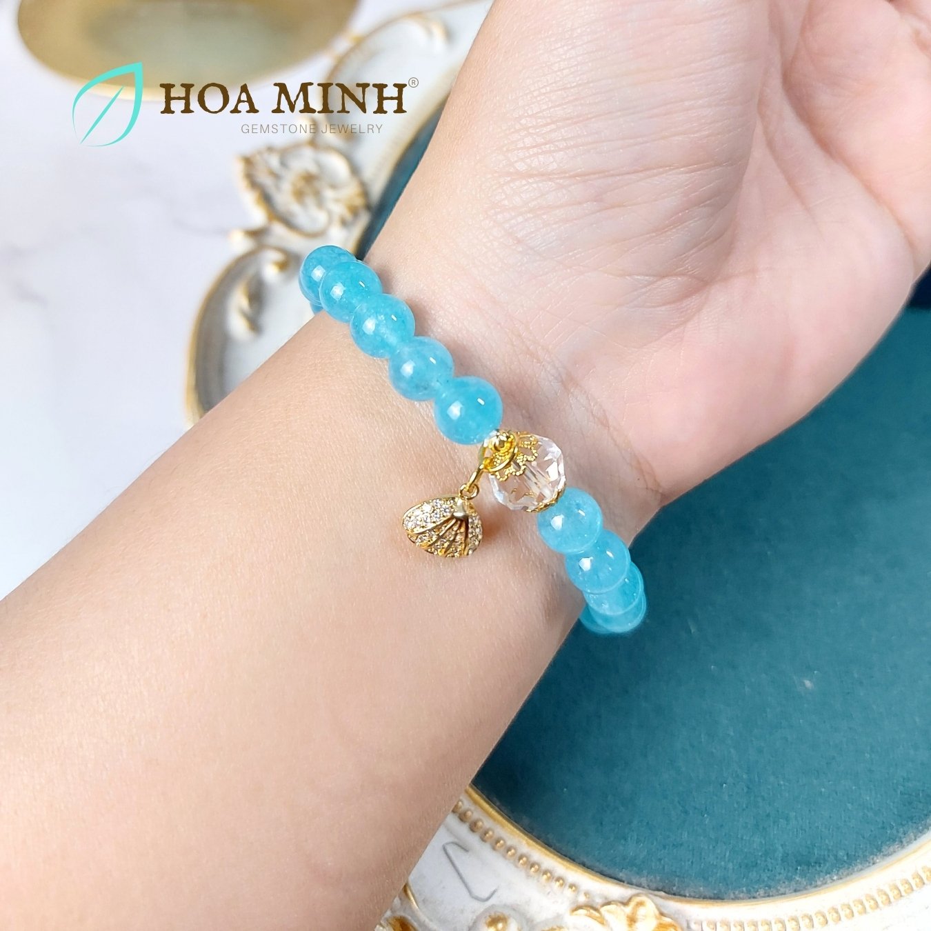 4-vong-tay-ngoc-hai-lam-aquamarine-8-li-phoi-vien-thach-anh-trang-oval-cat-giac-op-hoa-charm-treo-so-dinh-da-hoa-minh-gem.jpg