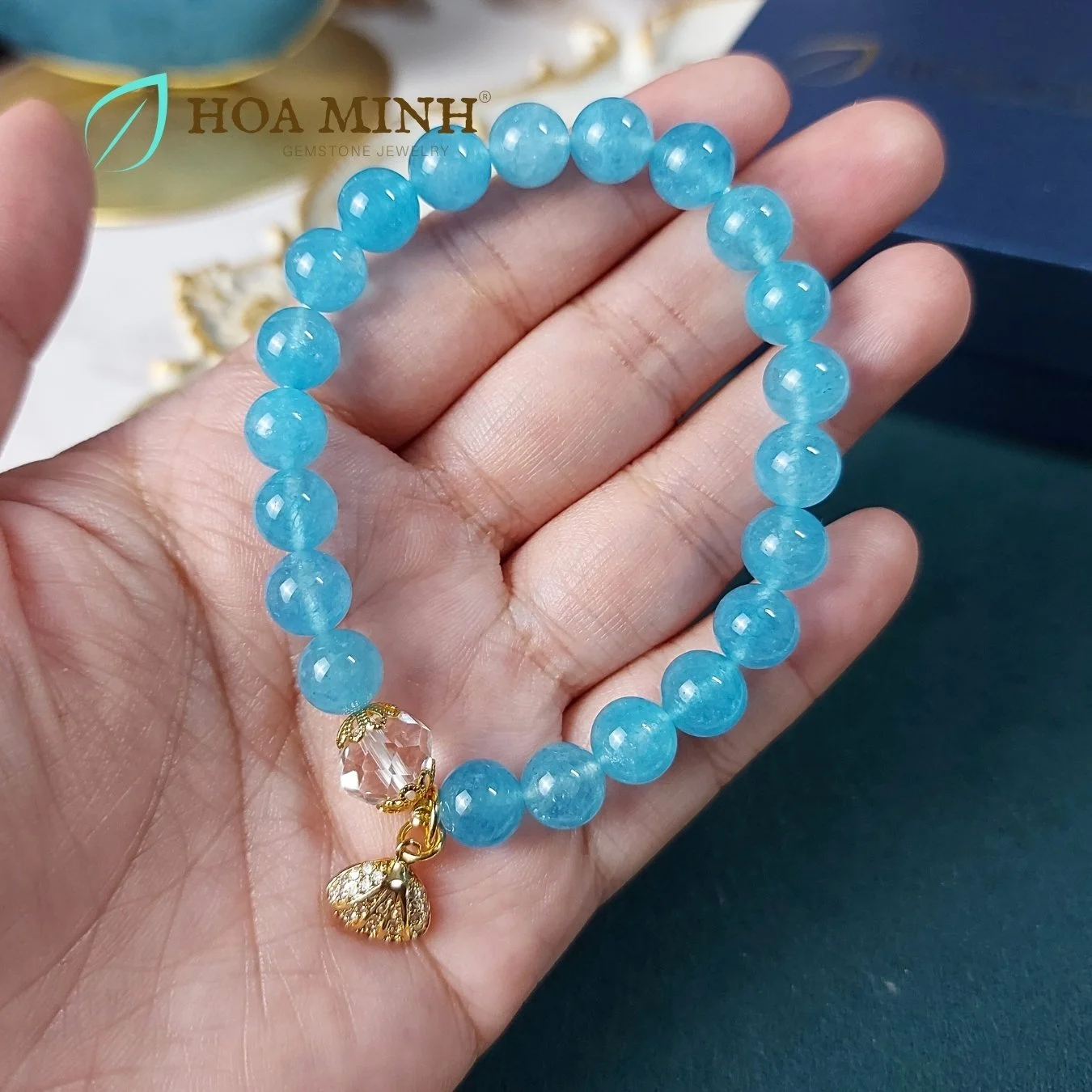 6-vong-tay-ngoc-hai-lam-aquamarine-8-li-phoi-vien-thach-anh-trang-oval-cat-giac-op-hoa-charm-treo-so-dinh-da-hoa-minh-gem.jpg