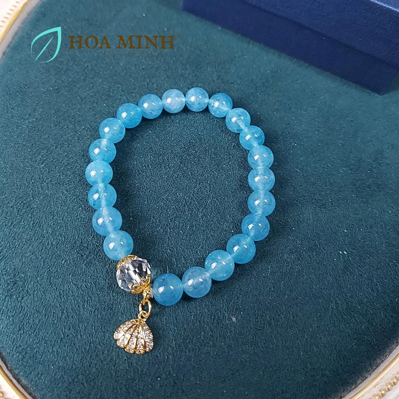 5-vong-tay-ngoc-hai-lam-aquamarine-8-li-phoi-vien-thach-anh-trang-oval-cat-giac-op-hoa-charm-treo-so-dinh-da-hoa-minh-gem.jpg