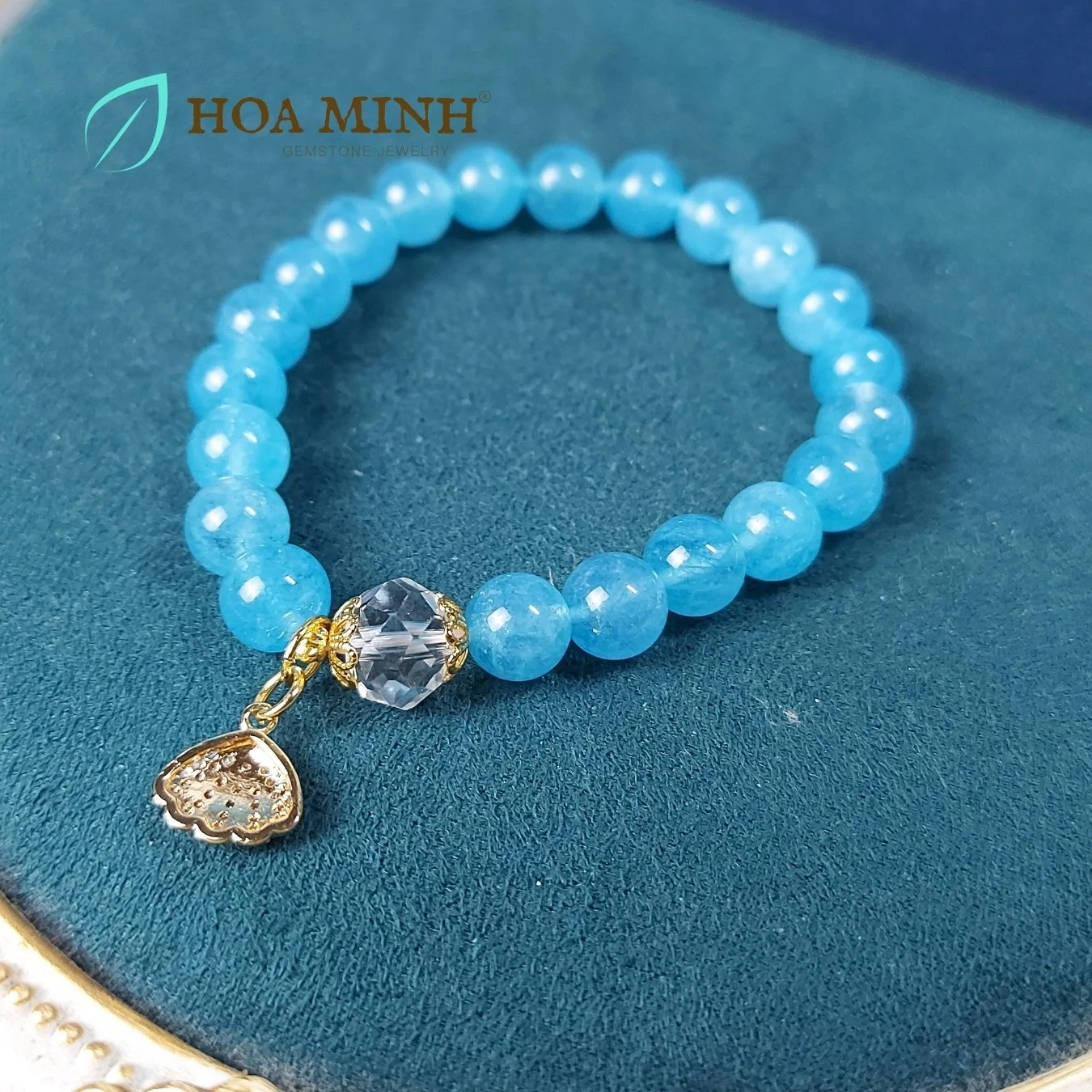 7-vong-tay-ngoc-hai-lam-aquamarine-8-li-phoi-vien-thach-anh-trang-oval-cat-giac-op-hoa-charm-treo-so-dinh-da-hoa-minh-gem.jpg