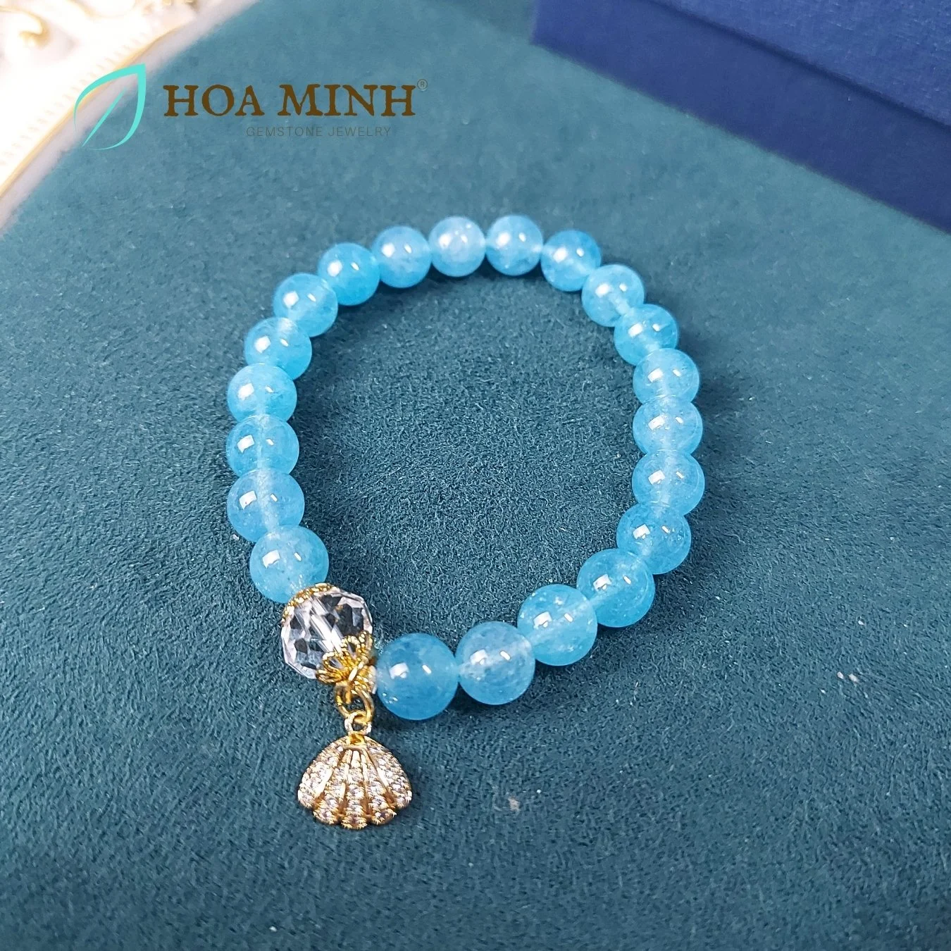 9-vong-tay-ngoc-hai-lam-aquamarine-8-li-phoi-vien-thach-anh-trang-oval-cat-giac-op-hoa-charm-treo-so-dinh-da-hoa-minh-gem.jpg