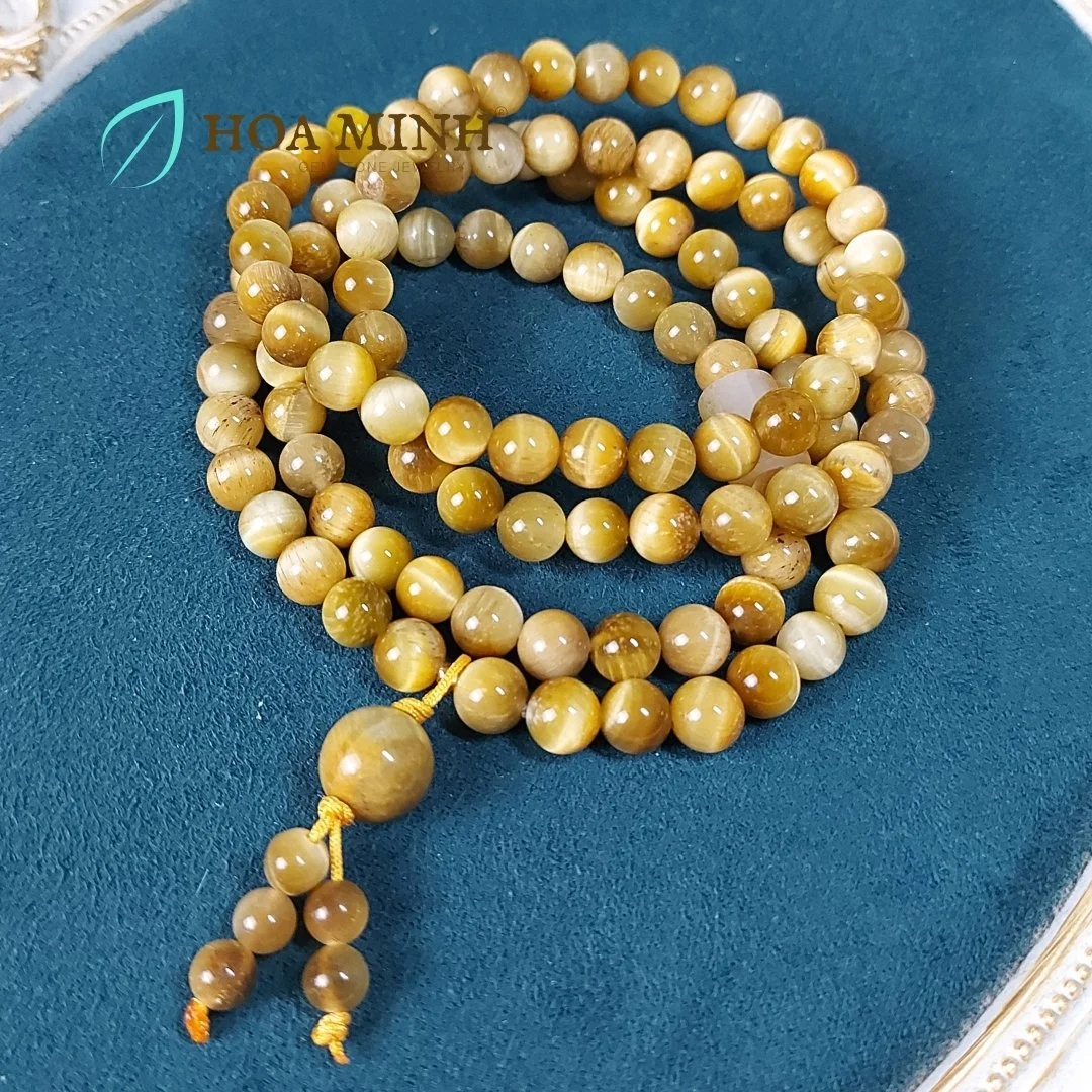 1-chuoi-108-hat-da-mat-ho-vang-tam-size-hat-8-3-li-phoi-lu-thong-ma-nao-vang-banh-xe-ma-nao-da-mat-meo-phong-cach-binh-an-may-man-hoa-minh-gem.jpg