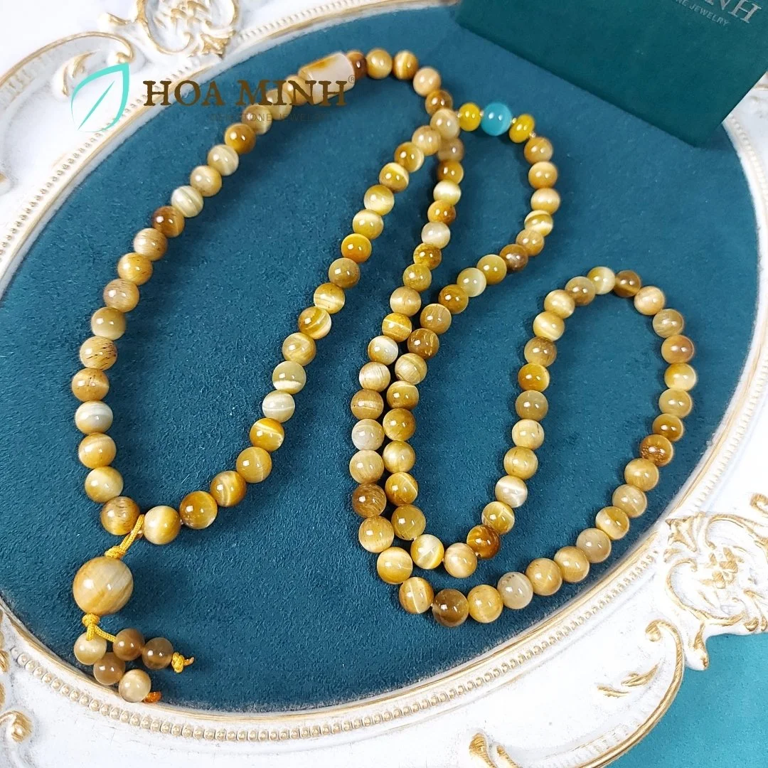 5-chuoi-108-hat-da-mat-ho-vang-tam-size-hat-8-3-li-phoi-lu-thong-ma-nao-vang-banh-xe-ma-nao-da-mat-meo-phong-cach-binh-an-may-man-hoa-minh-gem.jpg