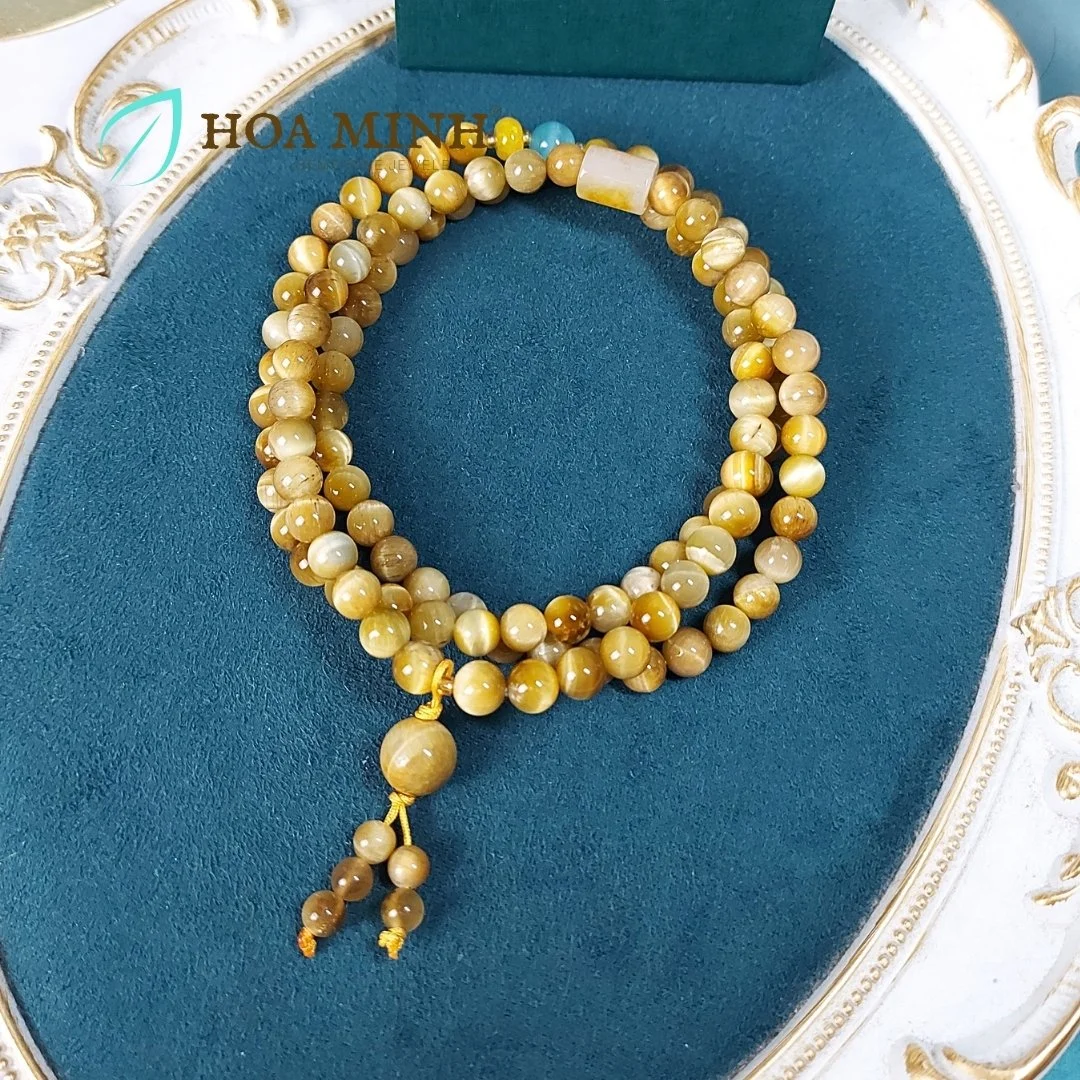 6-chuoi-108-hat-da-mat-ho-vang-tam-size-hat-8-3-li-phoi-lu-thong-ma-nao-vang-banh-xe-ma-nao-da-mat-meo-phong-cach-binh-an-may-man-hoa-minh-gem.jpg