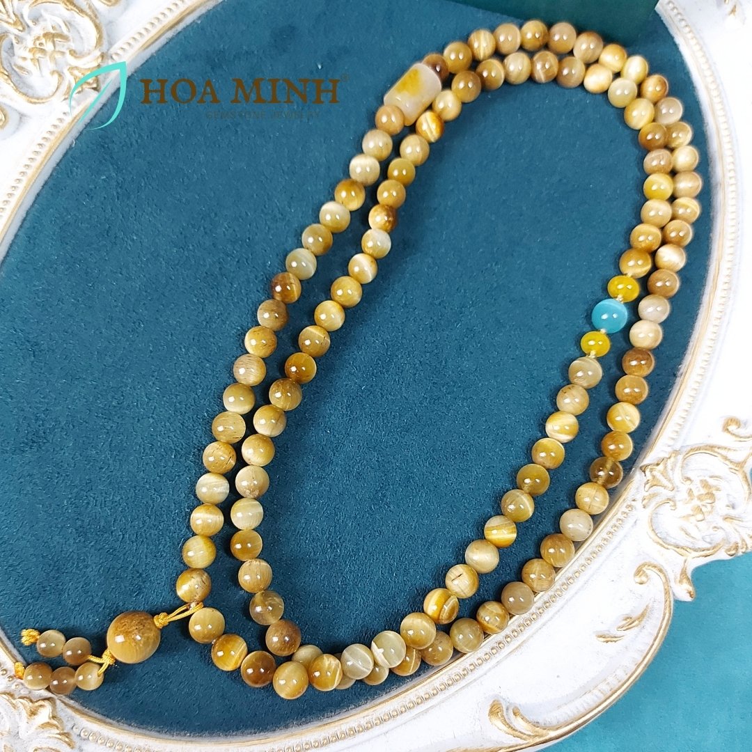 9-chuoi-108-hat-da-mat-ho-vang-tam-size-hat-8-3-li-phoi-lu-thong-ma-nao-vang-banh-xe-ma-nao-da-mat-meo-phong-cach-binh-an-may-man-hoa-minh-gem.jpg