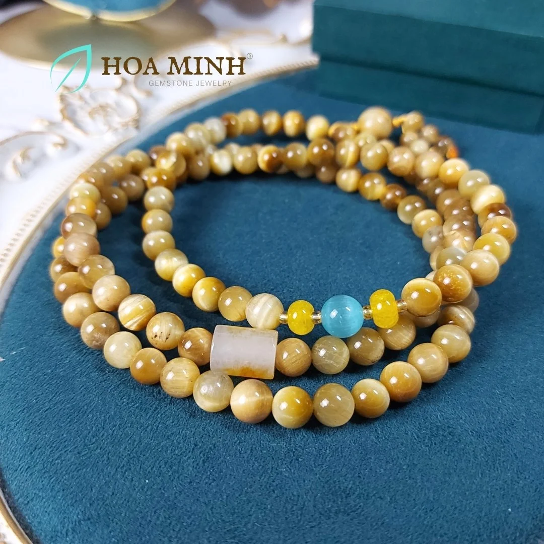 10-chuoi-108-hat-da-mat-ho-vang-tam-size-hat-8-3-li-phoi-lu-thong-ma-nao-vang-banh-xe-ma-nao-da-mat-meo-phong-cach-binh-an-may-man-hoa-minh-gem.jpg