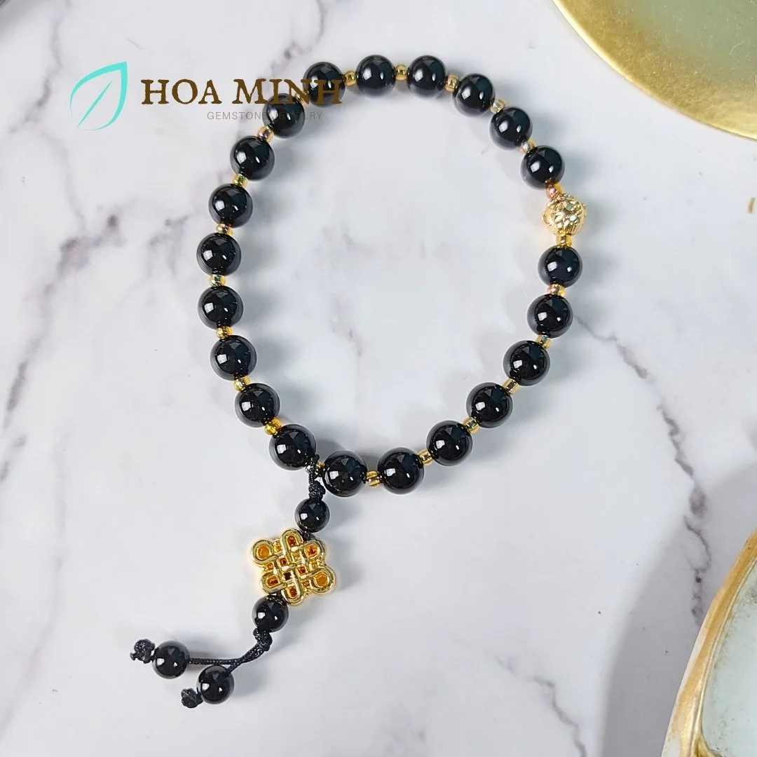 1-vong-chuoi-niem-21-vien-da-ma-nao-den-size-hat-8-li-phoi-charm-bi-vang-charm-nut-cat-tuong-xi-vang-binh-an-hoa-minh-gem.jpg