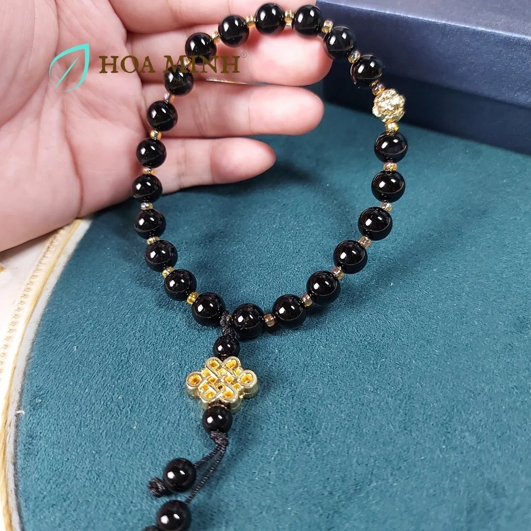 8-vong-chuoi-niem-21-vien-da-ma-nao-den-size-hat-8-li-phoi-charm-bi-vang-charm-nut-cat-tuong-xi-vang-binh-an-hoa-minh-gem.jpg