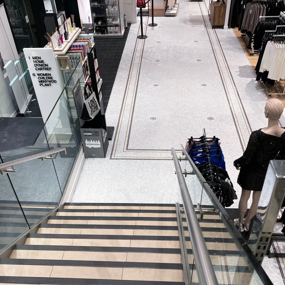 One of our latest flooring installations took us back to the high street at Next, in South West Wales. 

The project was to uplift approximately 80 sqm of 600 x 600 ceramics and install intricate mosaic tiles. The entrance matting was also to be repl