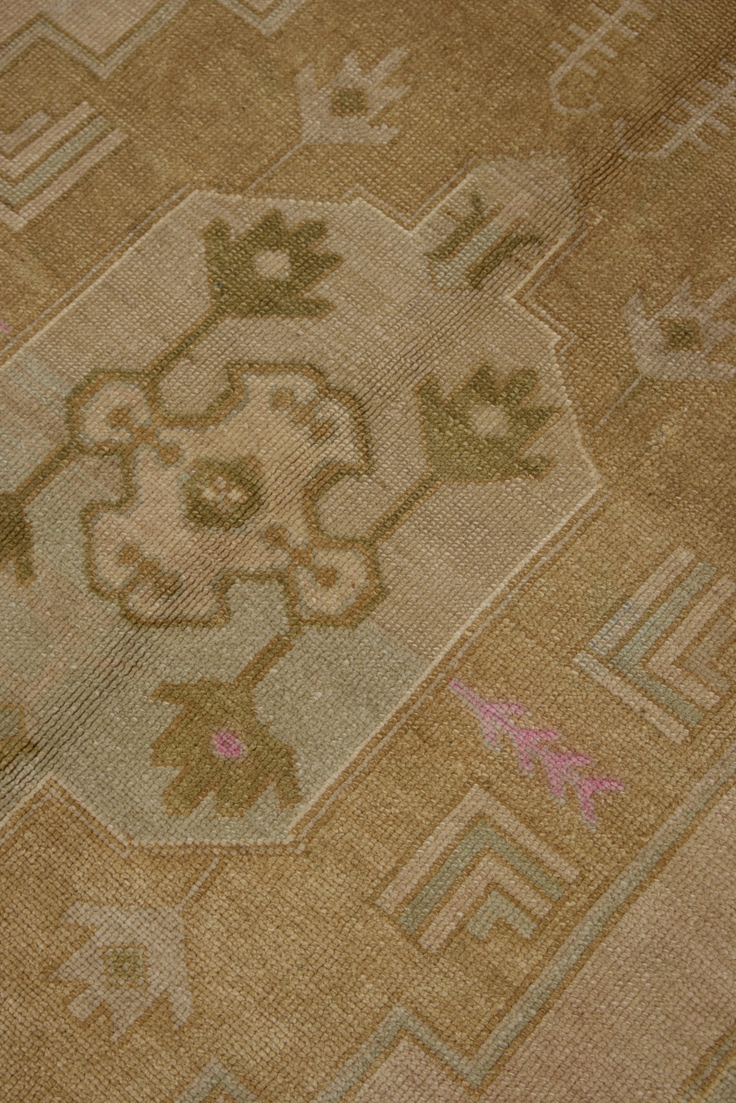 Close up detail of central medallion with tribal motifs