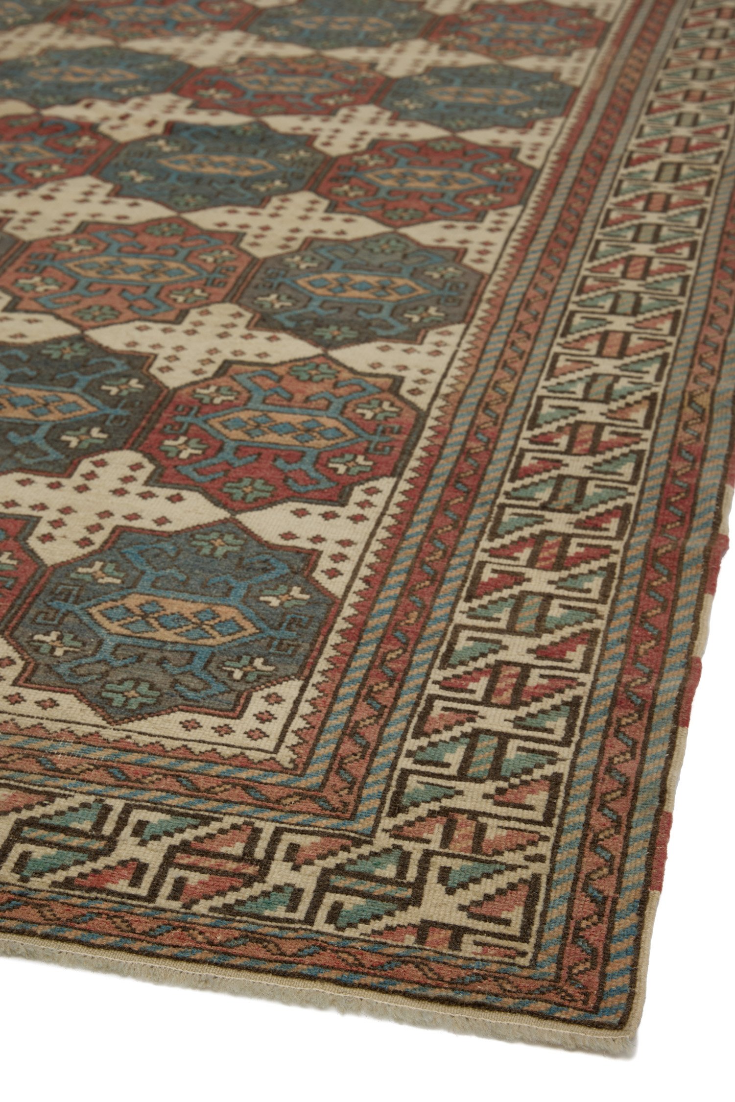 Right angle view of Turkish Oushak rug displaying complete design
