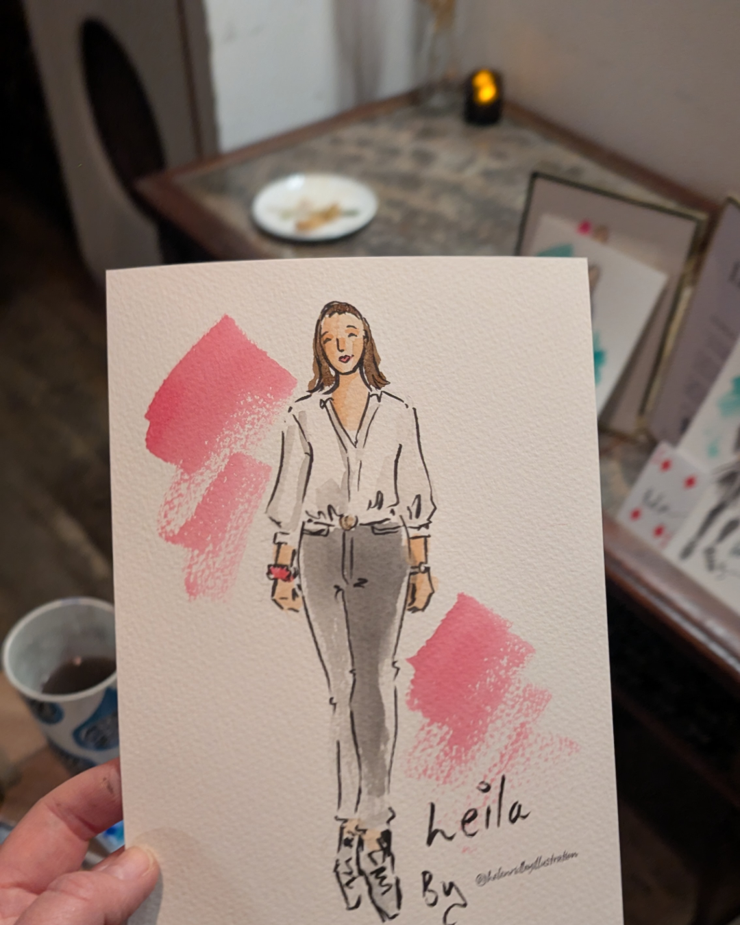 Fashion sketch portrait of a lady in a white blouse and grey trousers live illustrated by Helen Ridley