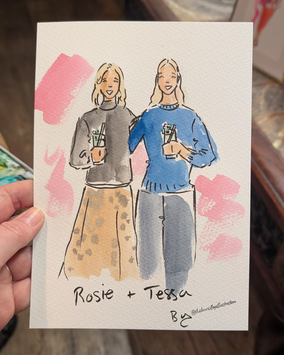 Hand painted illustration of a two ladies wearing blue and grey jumpers by Illustrator Helen Ridley