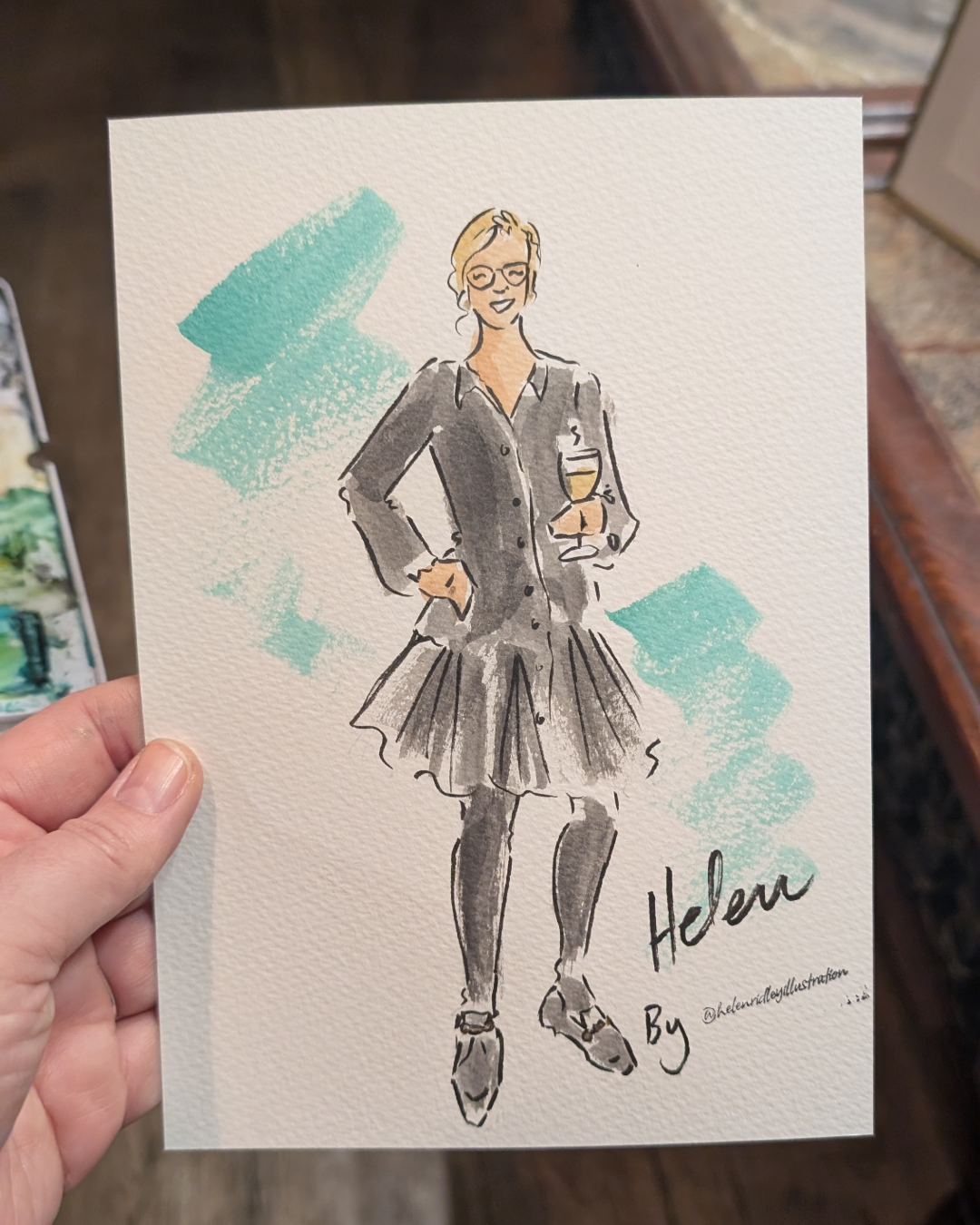 Hand painted water-colour illustration of a lady holding wine and wearing black dress by Illustrator Helen Ridley