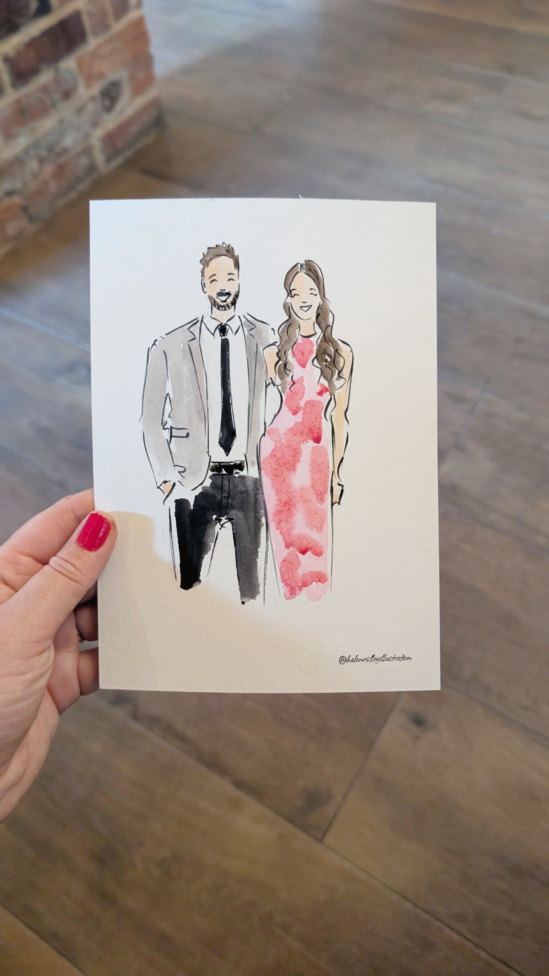 A wedding couple wearing pink dress and grey suit illustrated in watercolour by Helen Ridley