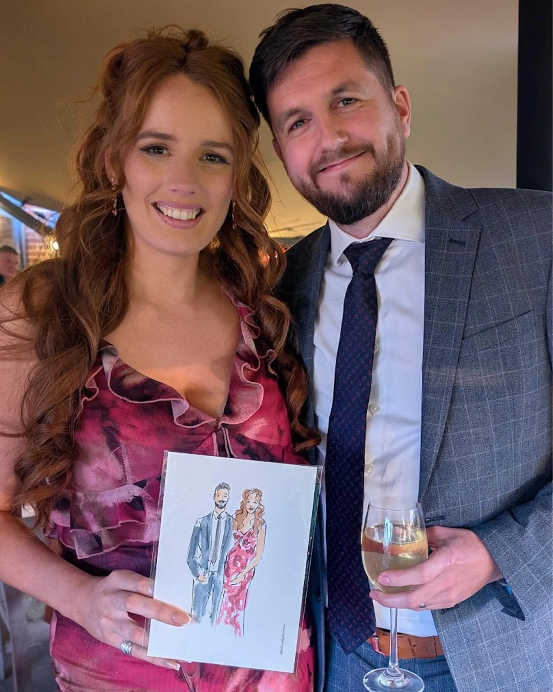 Wedding guests holding a live illustration of themselves