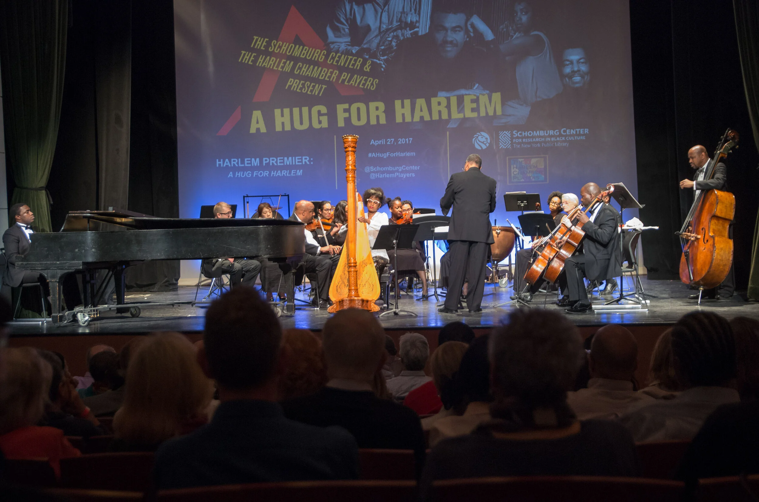 Harpist Ashley Jackson with orchestra for our “A Hug for Harlem” concert - April 2017.