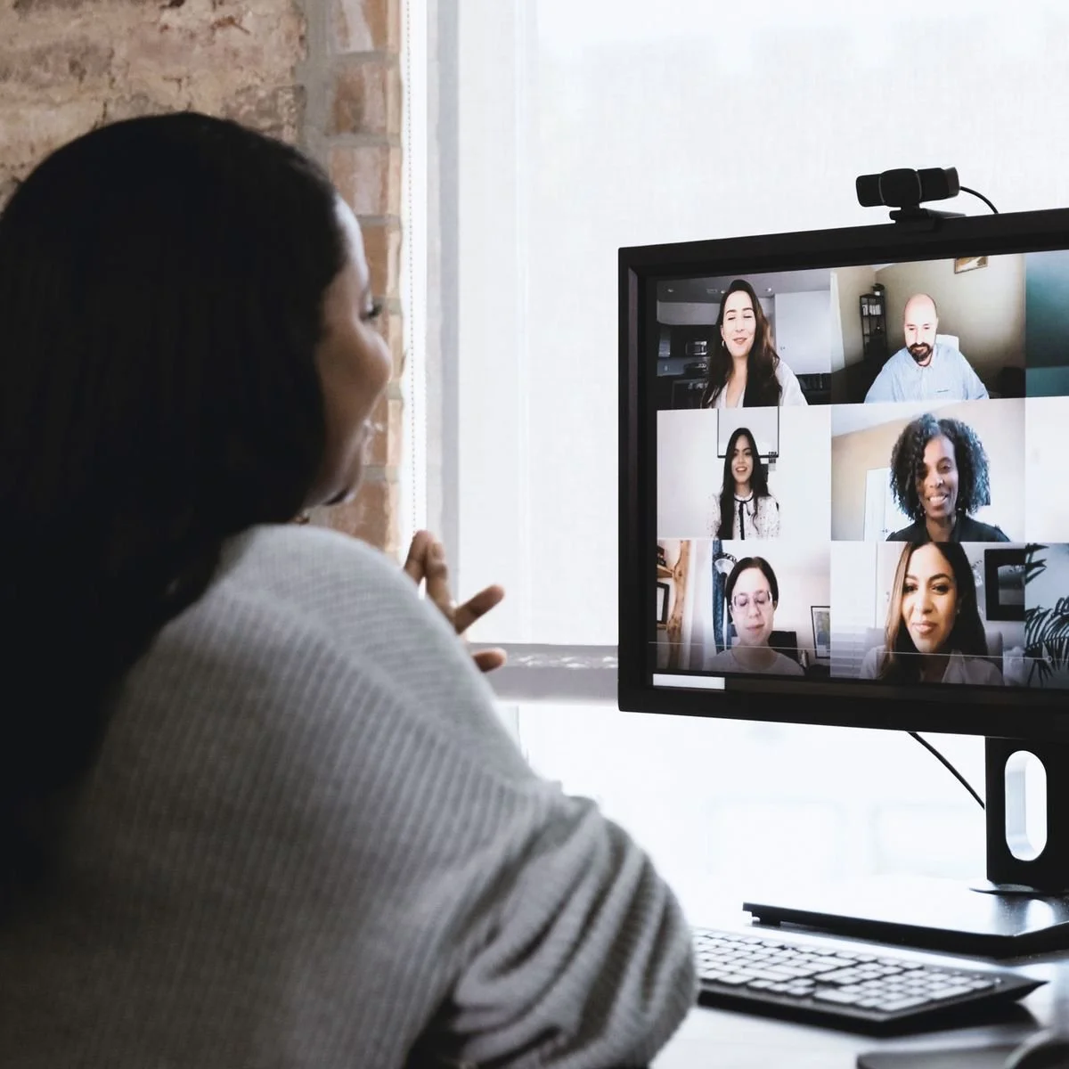 woman coaching on group call
