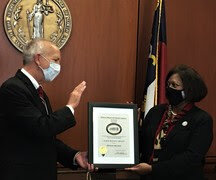Chief Justice Paul Newby presents Friend of the Court Award to Judge Wanda Bryant