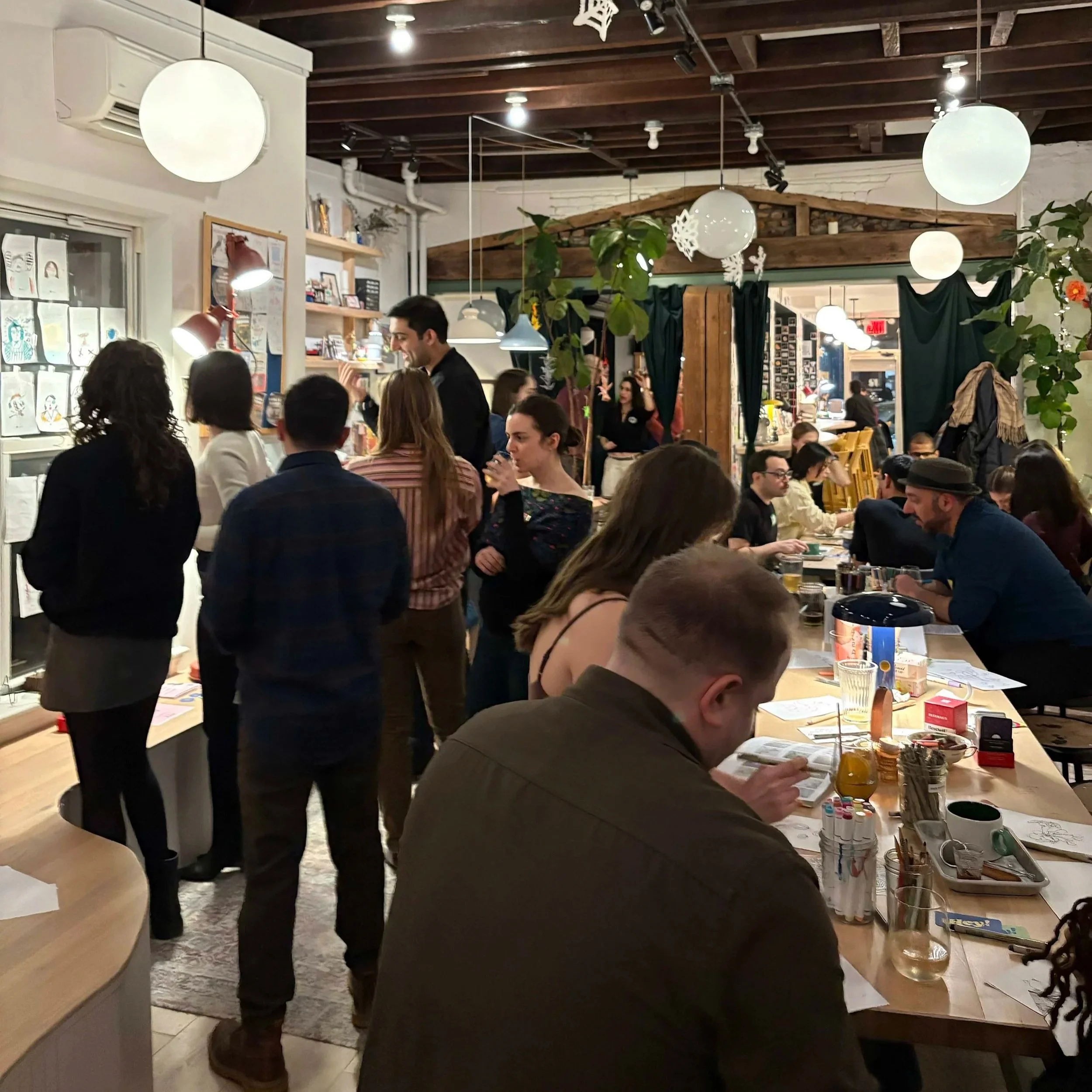 Soft socializing event of people doing arts amd crafts