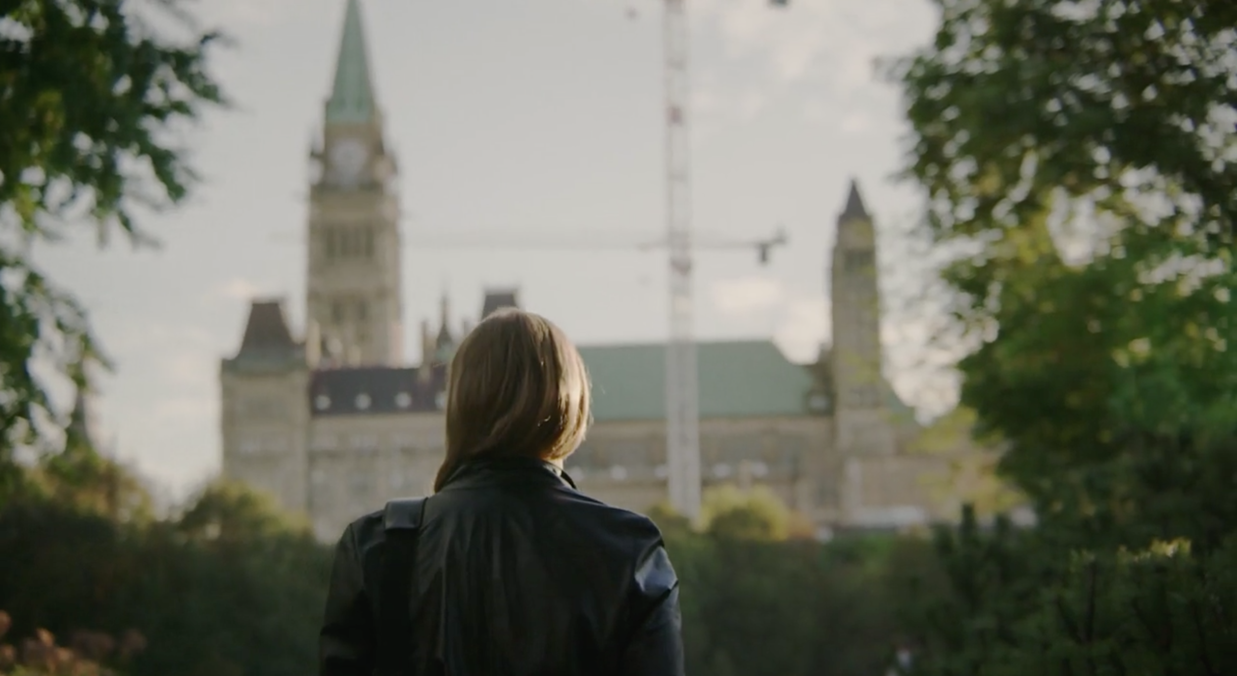 Woman Looks toward Canadian Parliament House in the summer, The Kiln video production