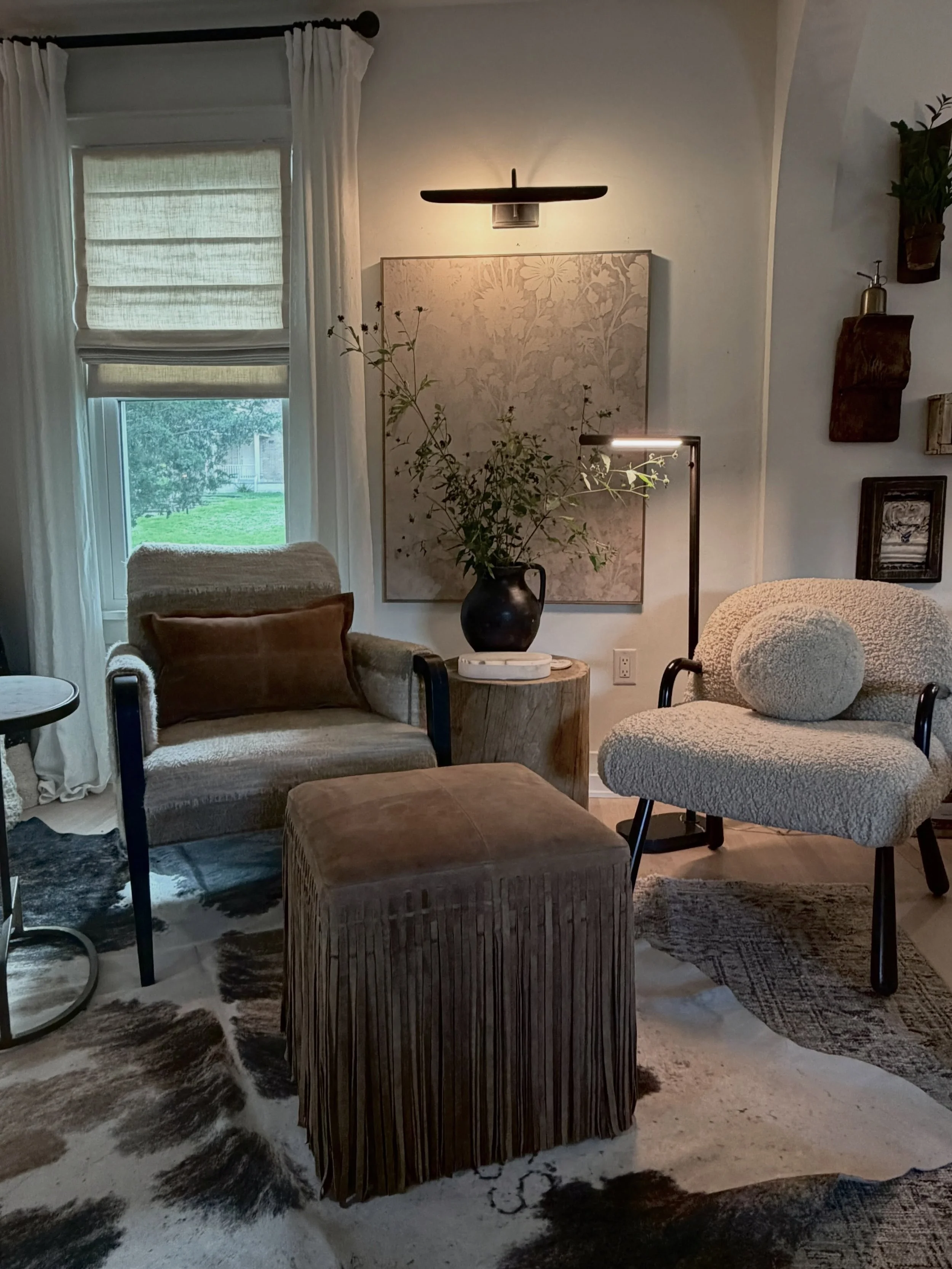 This little corner says so much about what I love about design.

I&rsquo;ve always been drawn to the mix- clean modern lines paired with something worn and imperfect. Luxe mixed with natural like a soft boucl&eacute; with old leather. Refined + raw.
