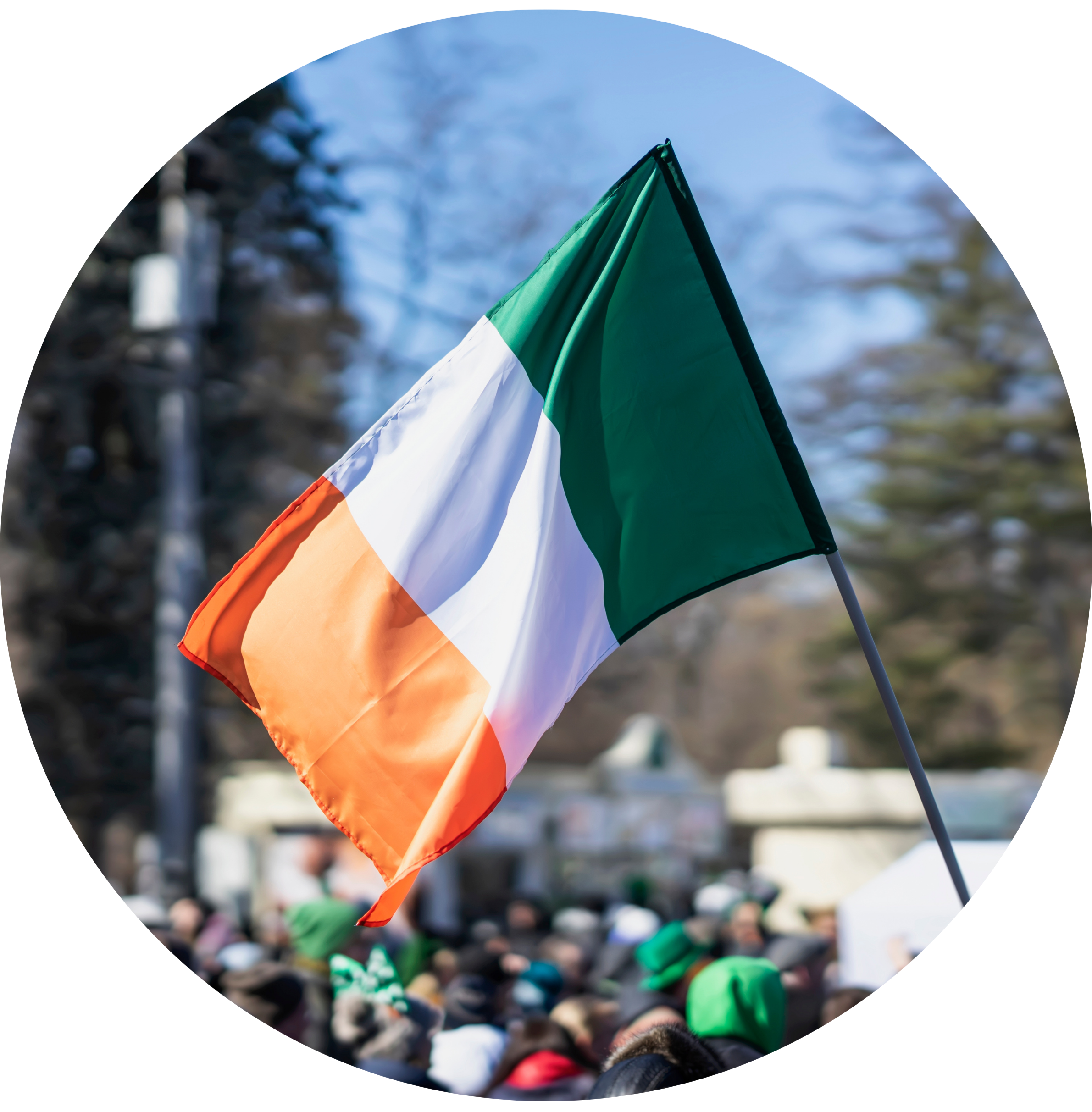 The Irish flag over top of parade attendees