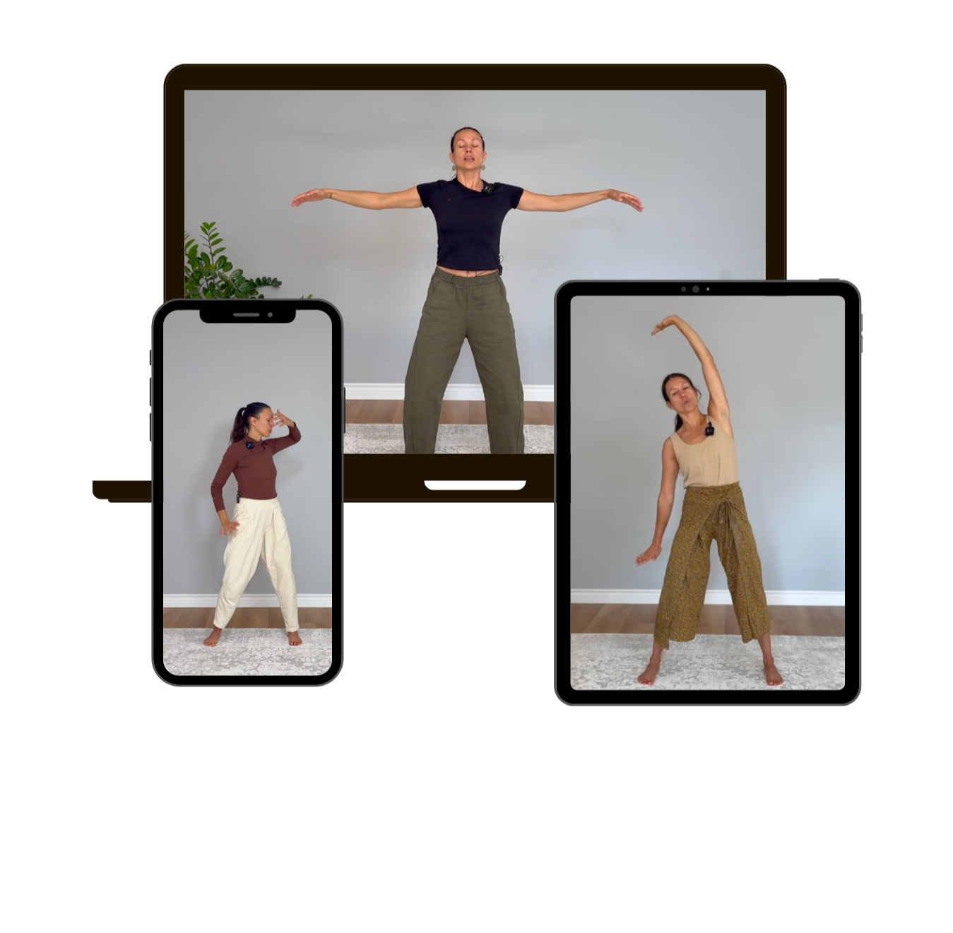 Women practicing yoga via video call on multiple devices showing different poses in front of a plain wall with a small plant in the background.