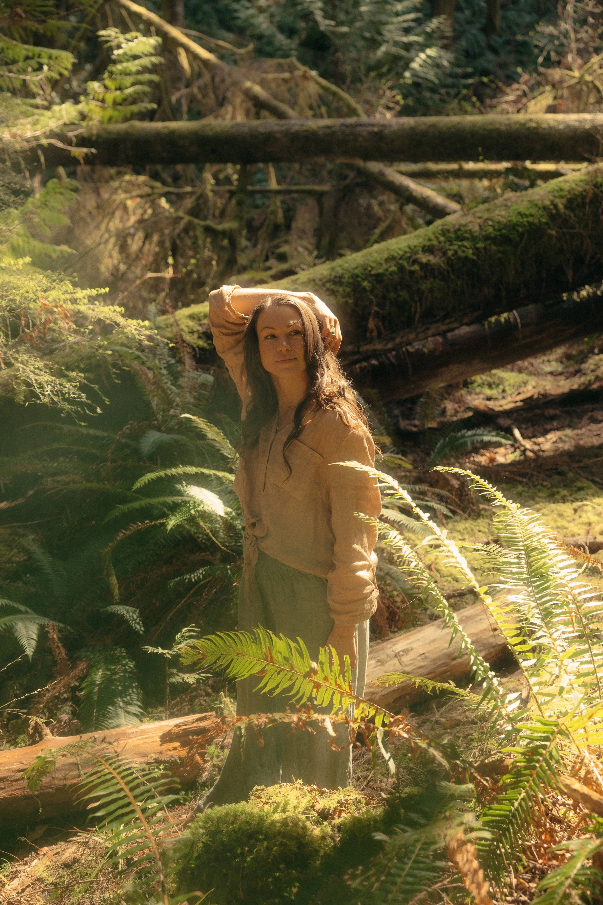 image of stephanie standing in forest
