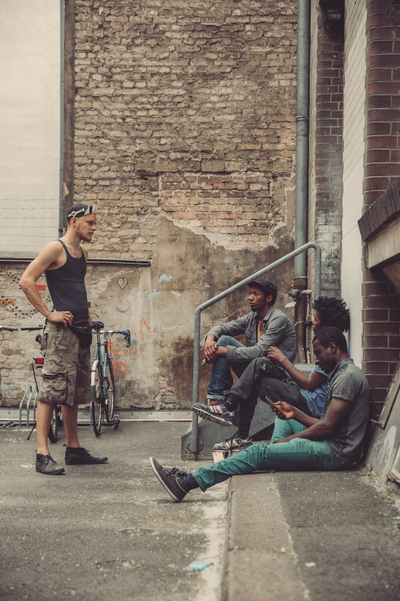  Yanik Balzer, Luis Amado Djalo, Malik Agachi and Yousuf Karim take a break during the workshop. 