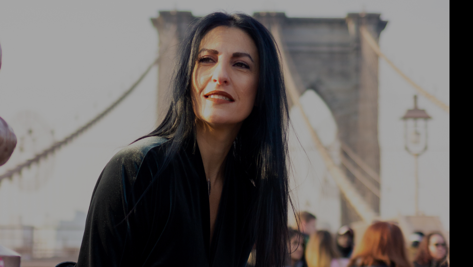 Pamela on Brooklyn Bridge  dark overlay flipped v2.png