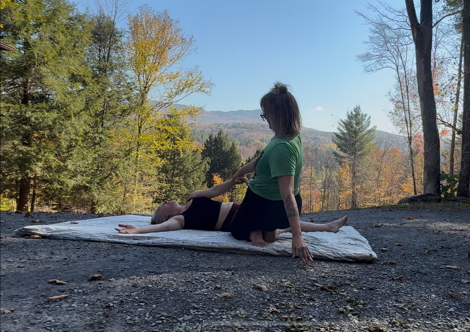 Catie in a Thai massage pose with one of her really good friends.