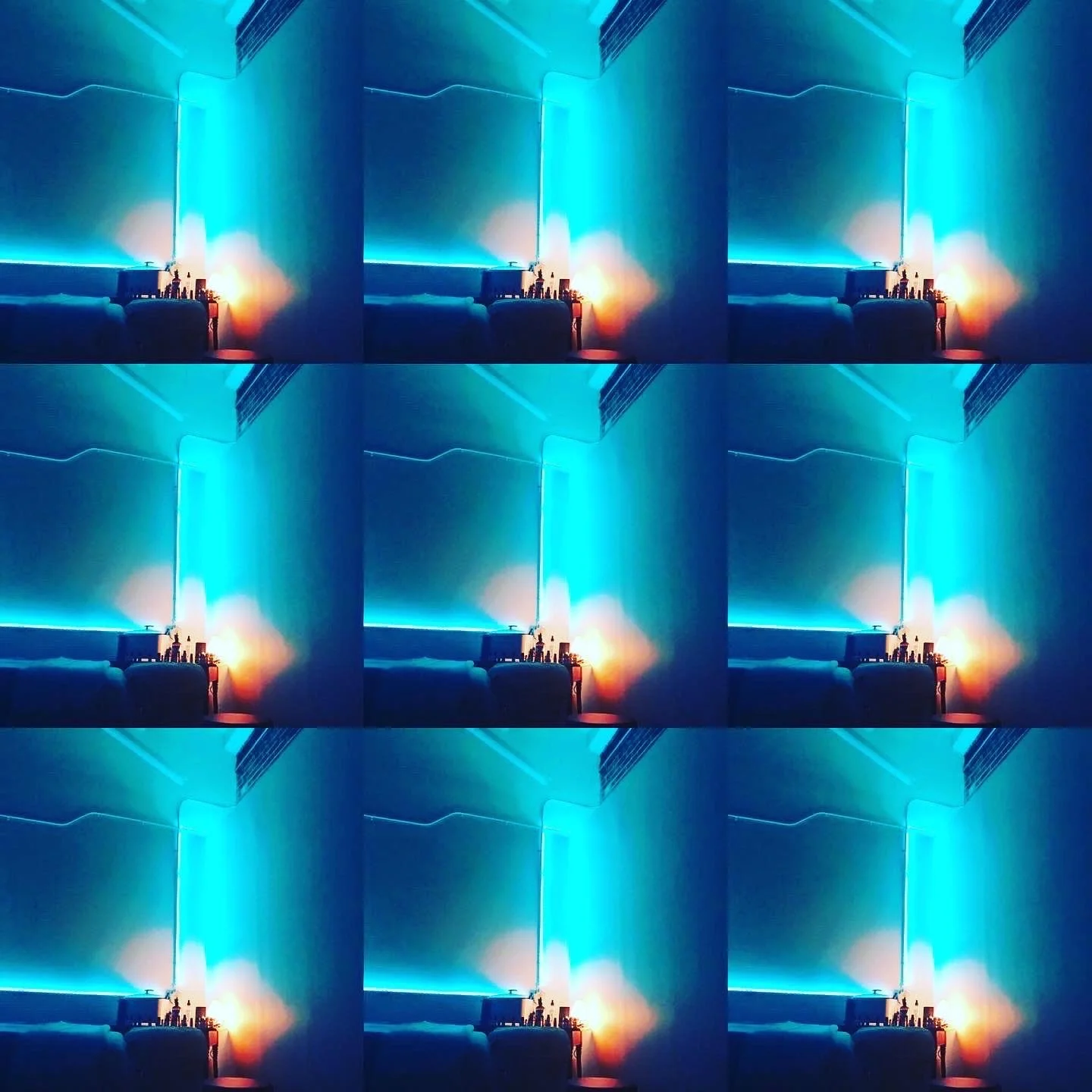 grid of neon blue lights shining on wall of Thai Massage Studio