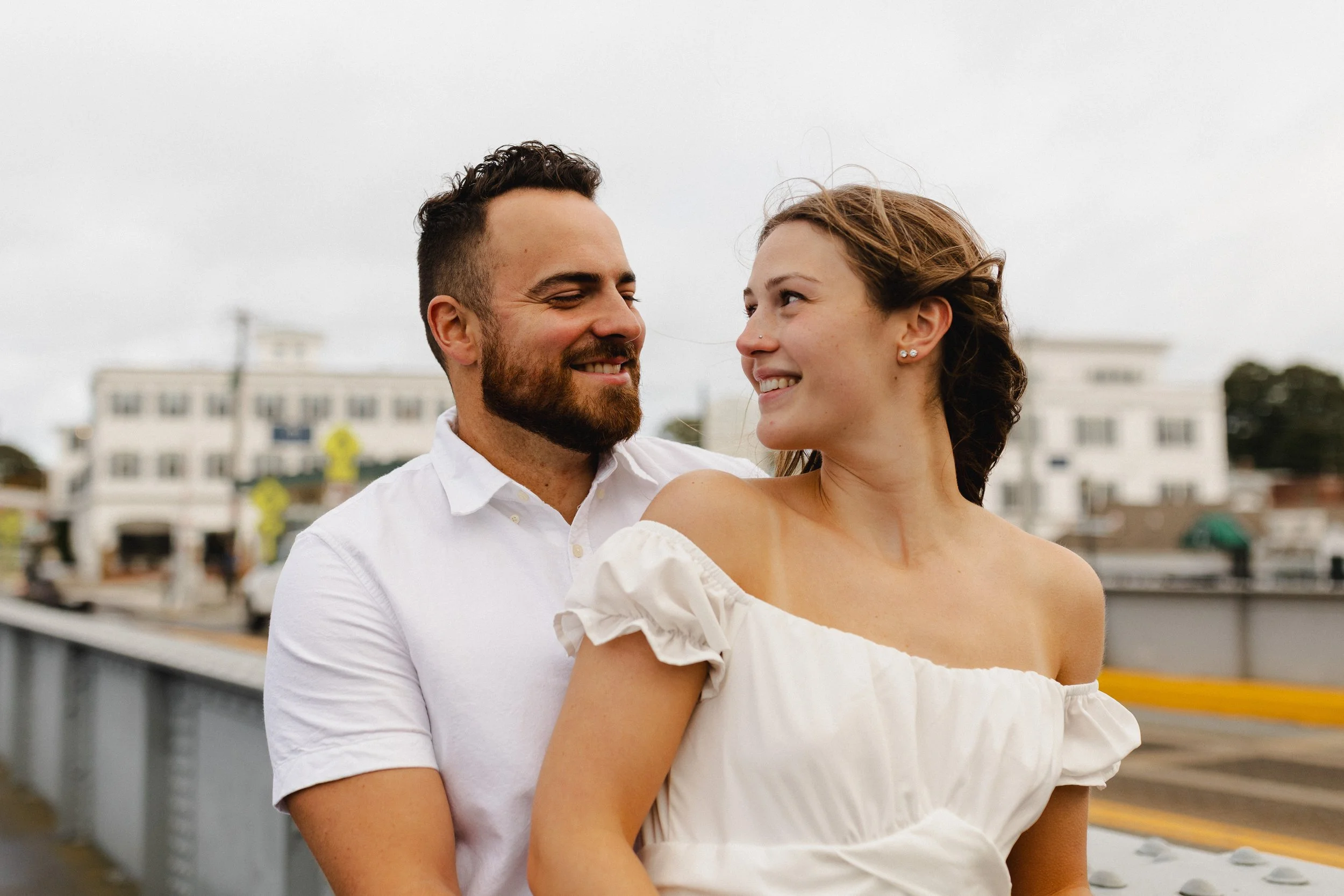 Candid engagement session portraits in Mystic, CT featuring an authentic, non-forced style.