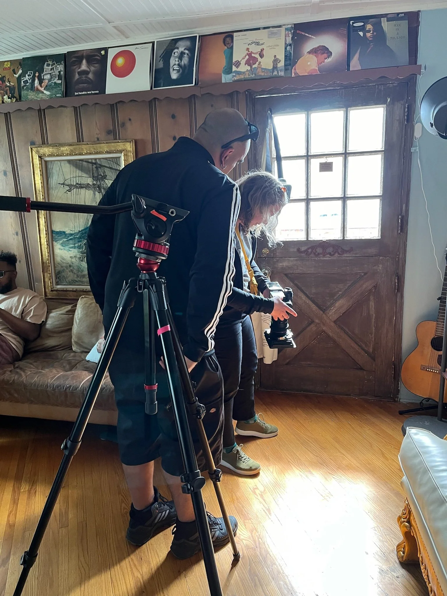 SD Day 1 - camera crew checking light and camera.jpeg
