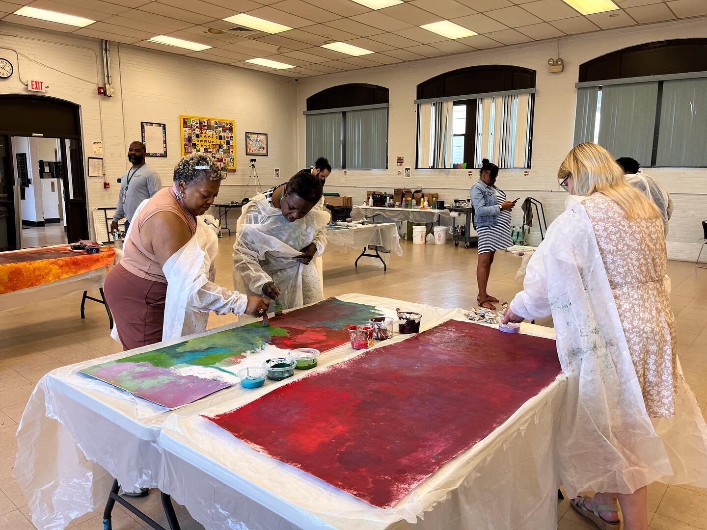 The second community paint day in Hamden, where participants came together to contribute to the MLK39 Mural by painting the colorful book spines. Projects like these fosters conversations and creates a sense of unity within the community. 
 
The upco