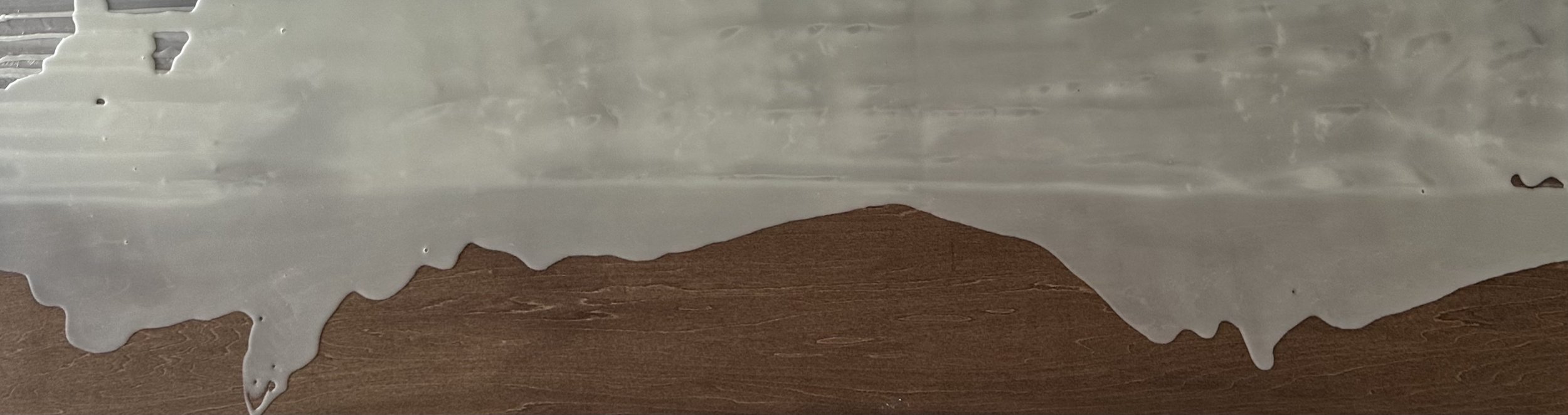 “Nuages” (Clouds)
12” x 48”
encaustic pour, walnut ink, 22k gold leaf on cradled panel