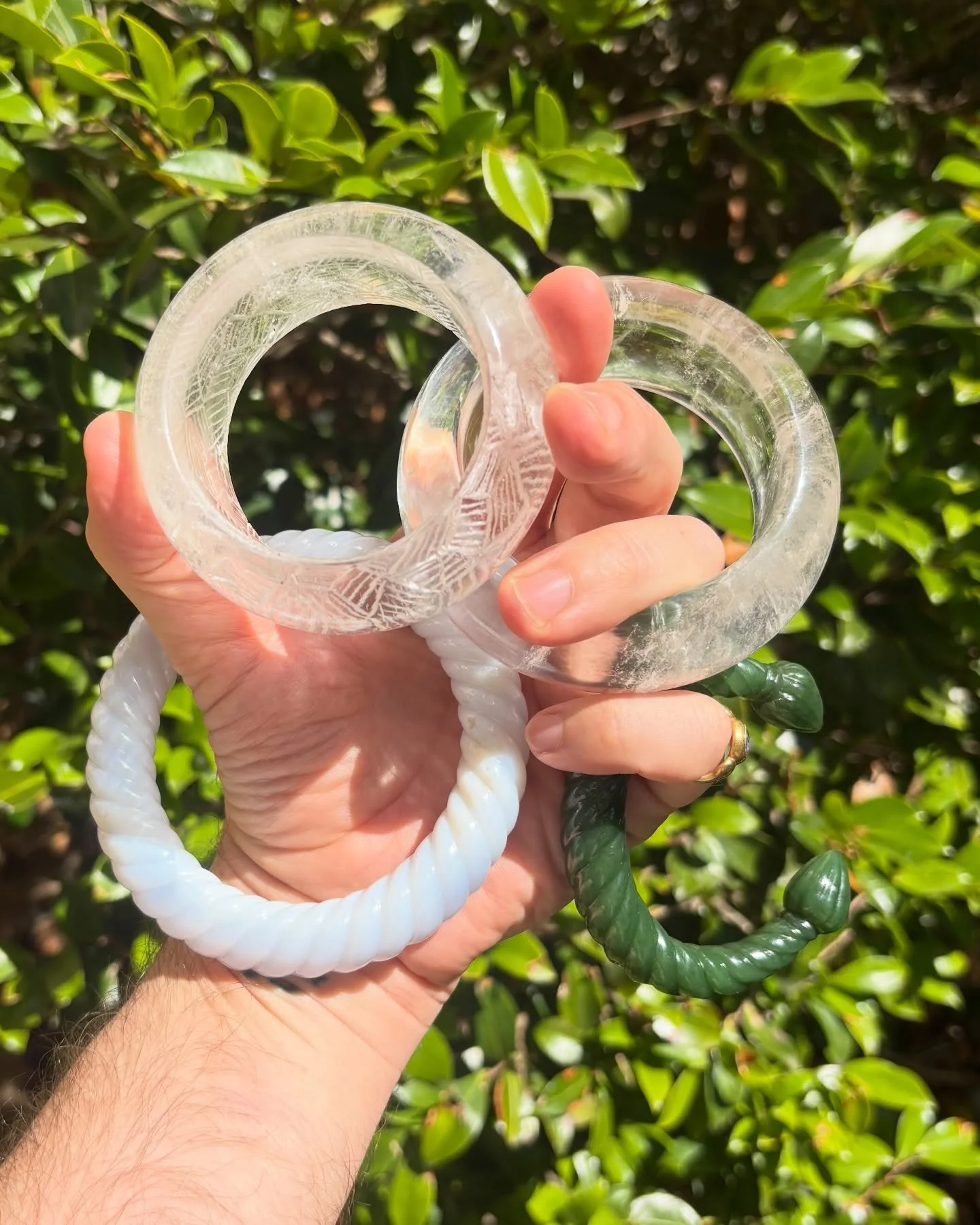 Few things say &lsquo;gemstone connoisseur&rsquo; like a carved gemstone bangle. 
Featured - 2 natural rock crystal bangles, white to blue chalcedony rope bangle, carved nephrite cuff
.
#gemstoneconnoisseur #gemstonebangle #nephritejade #carvedgemsto