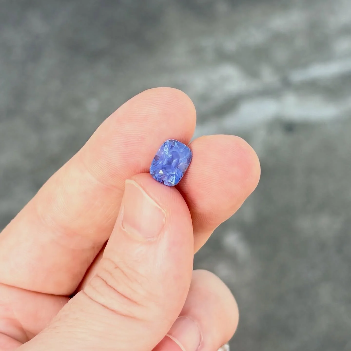 Such a smooth colour don&rsquo;t you think?
5.6ct Cushion shaped colour change sapphire. 
Available to purchase as a loose stone or I can make a jewellery piece for you. DM and let&rsquo;s discuss the process. 
.
#sapphireengagementring #colourchange