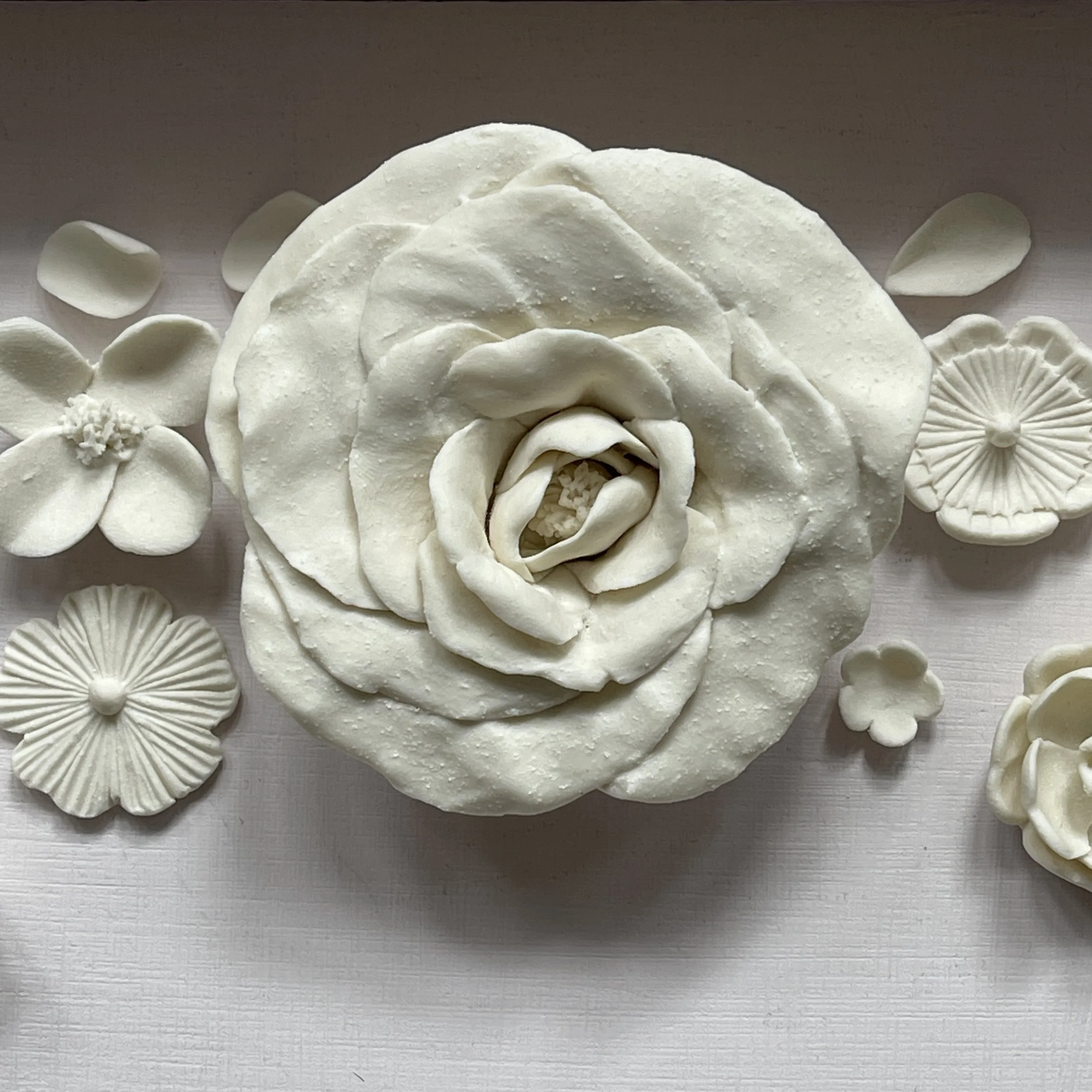 Textured white porcelain rose framed ceramic art by Kate Kelleher