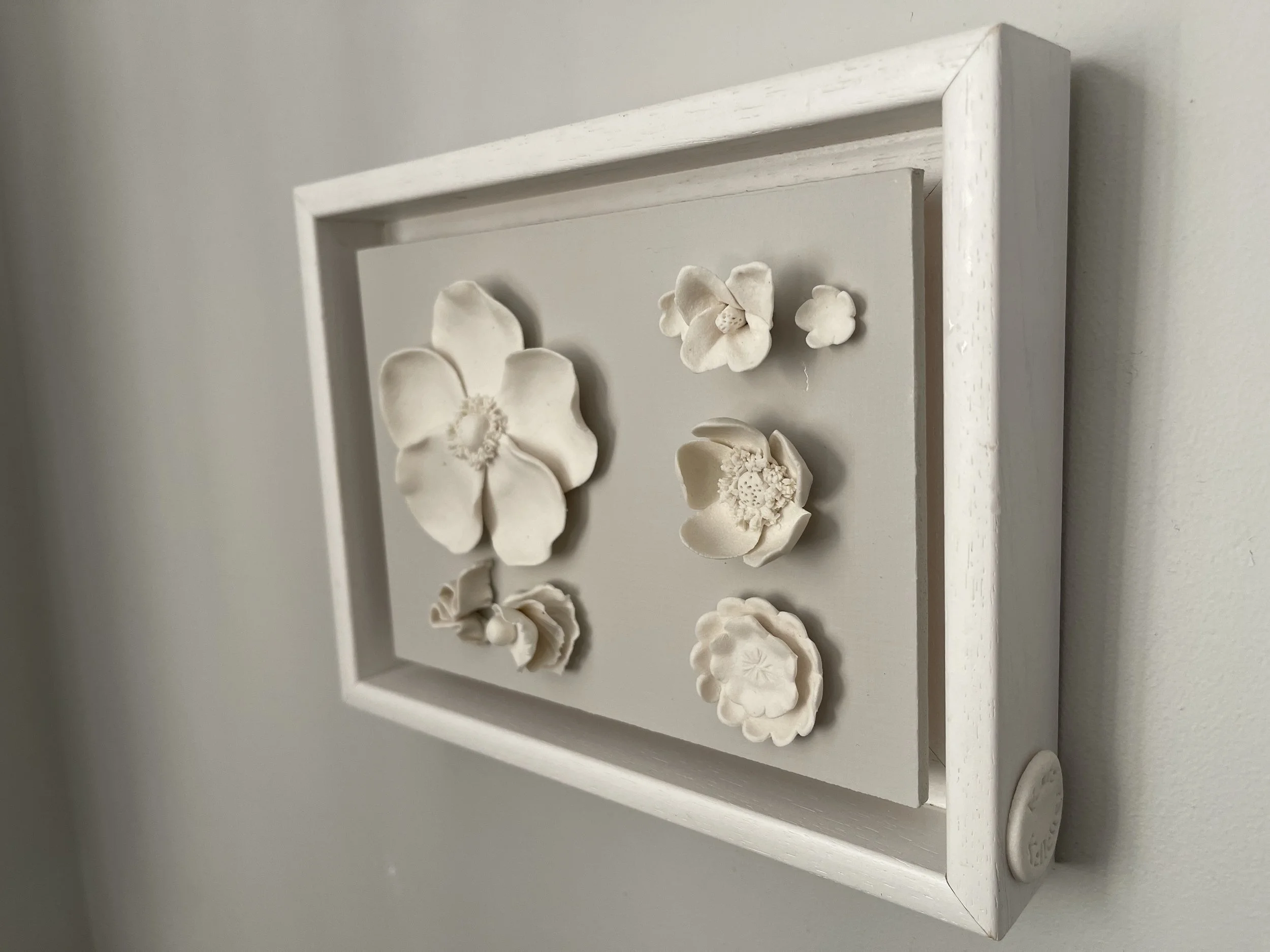 white clay porcelain flower anemone side view