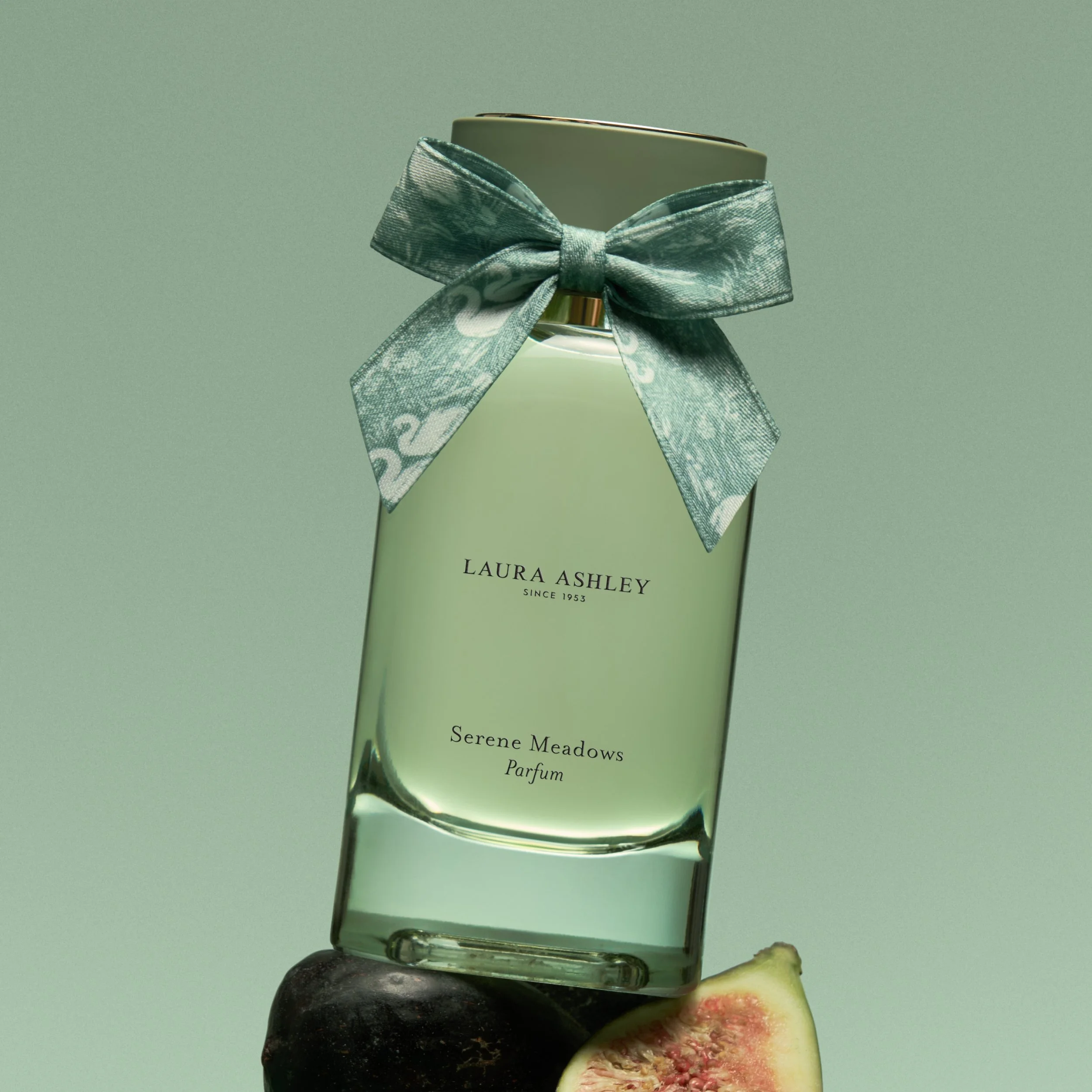 Laura Ashley Parfum bottle design showing custom glass shape design, heritage ribbon and and label detail