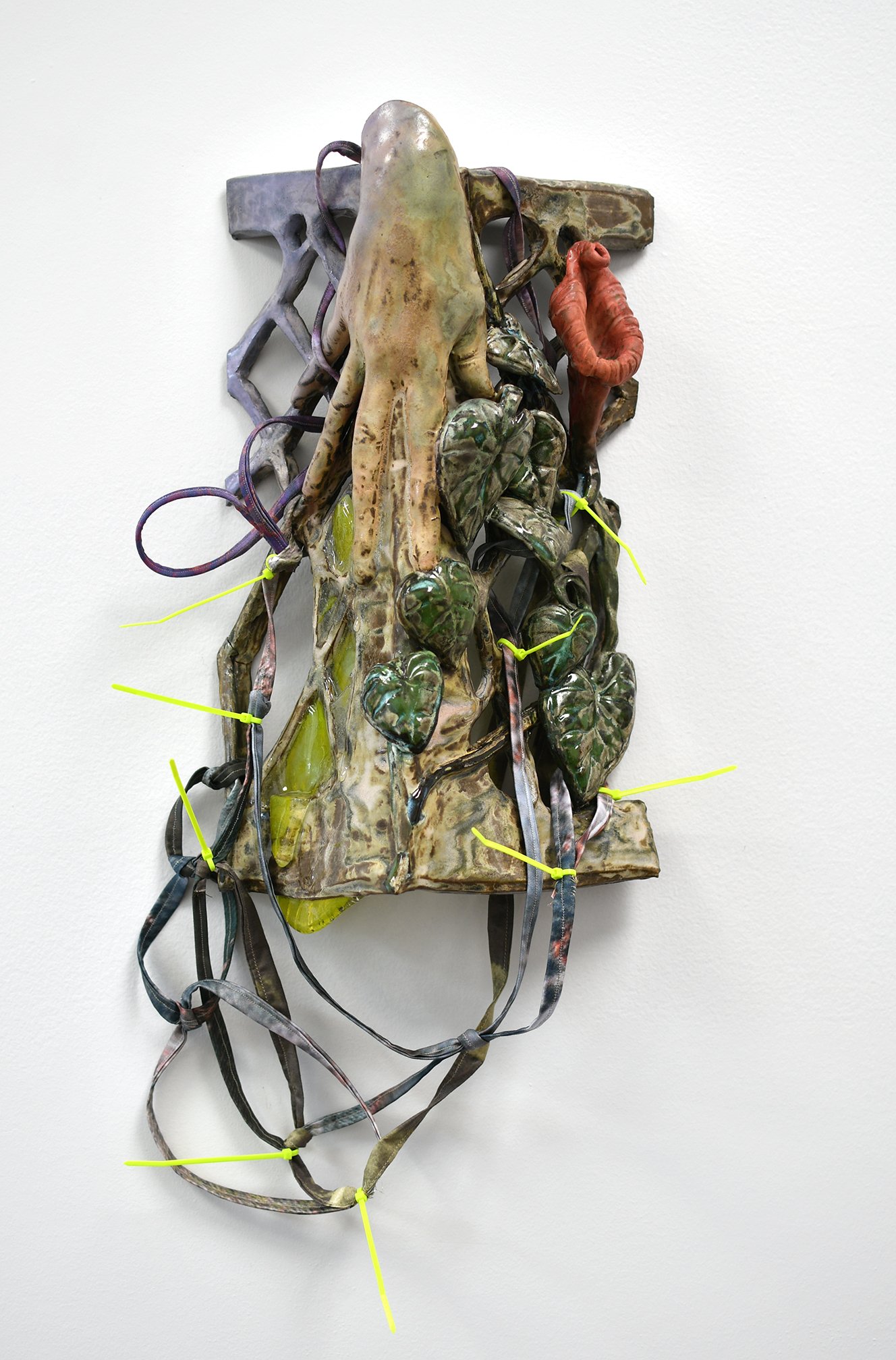 Rachel Frank, Chrysalid Neotropical Neon Slippage , 2024, Stoneware ceramic with glazes, fused glass, fabric, and zipties, 20 x 10.5 x 8 in. INQUIRE