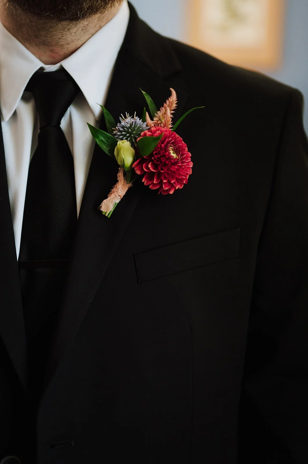 The Barn at Cauffiel Florist South Stems Boutonniere.jpg